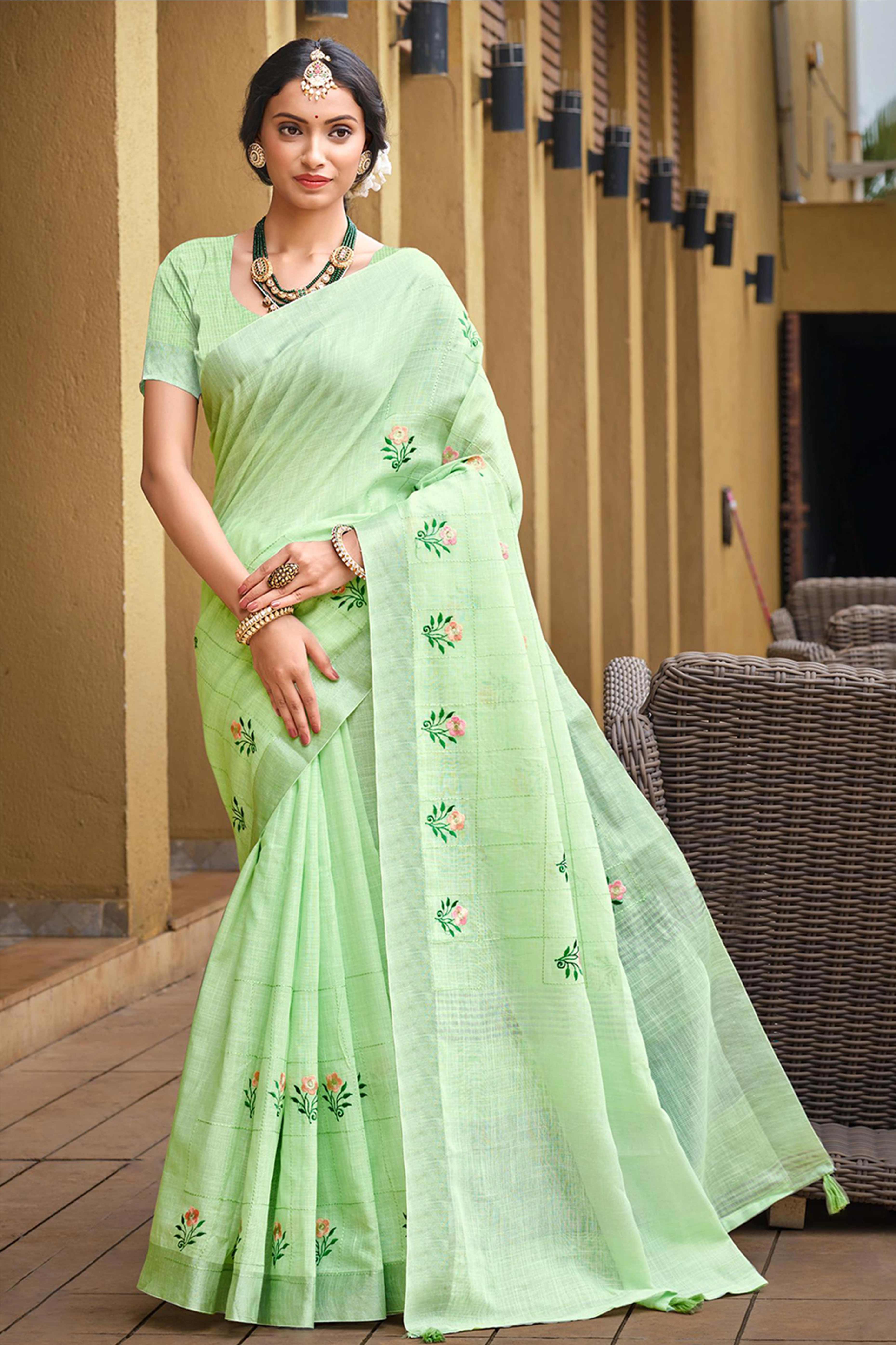 Captivating Green Floral Thread Embroidered Linen Saree With Elegant Weaving Border