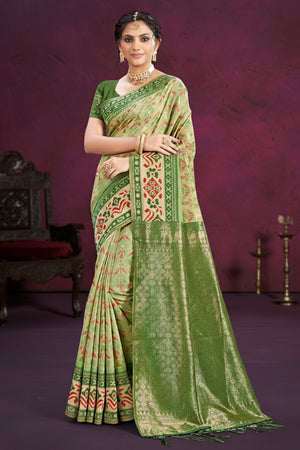 Designer Green Cotton Silk Saree Showcasing Delicate Floral Weaving & Tassel Pallu