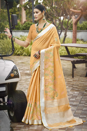 Classic Light Orange Leaf Pattern Thread Embroidery Work Linen Saree With Tassel Pallu