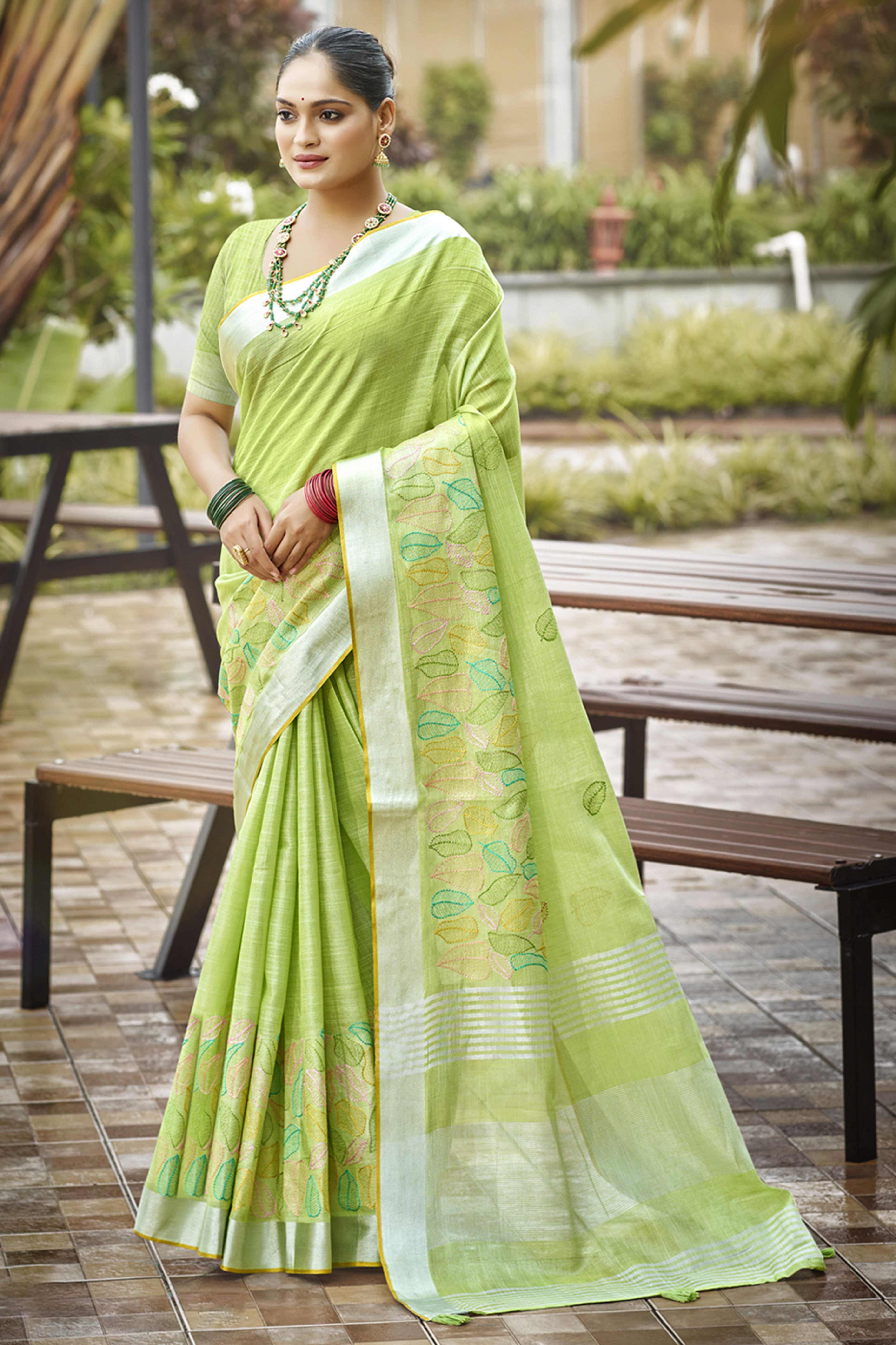 Classic Green Leaf Pattern Thread Embroidery Work Linen Saree With Tassel Pallu
