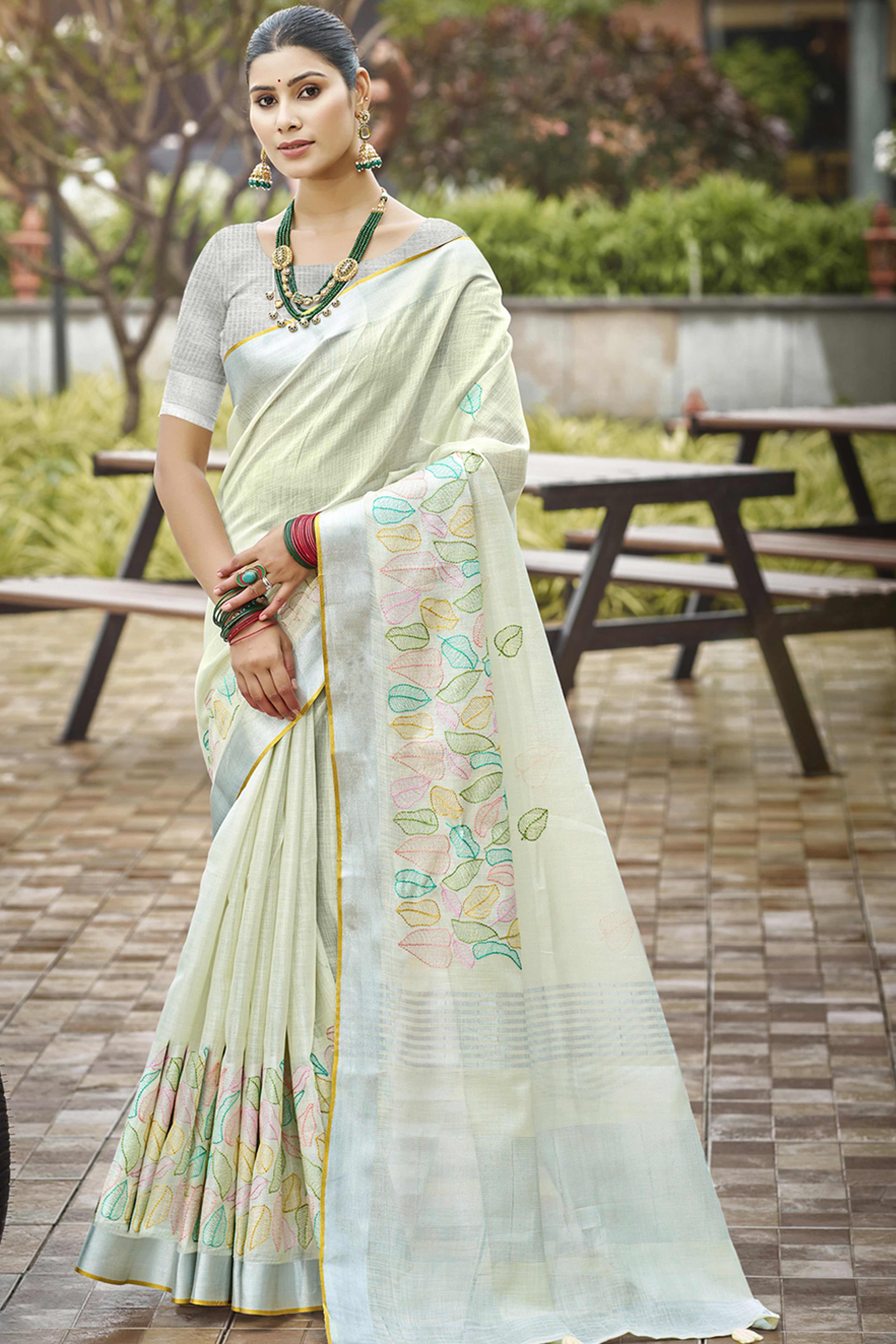 Classic Offwhite Leaf Pattern Thread Embroidery Work Linen Saree With Tassel Pallu