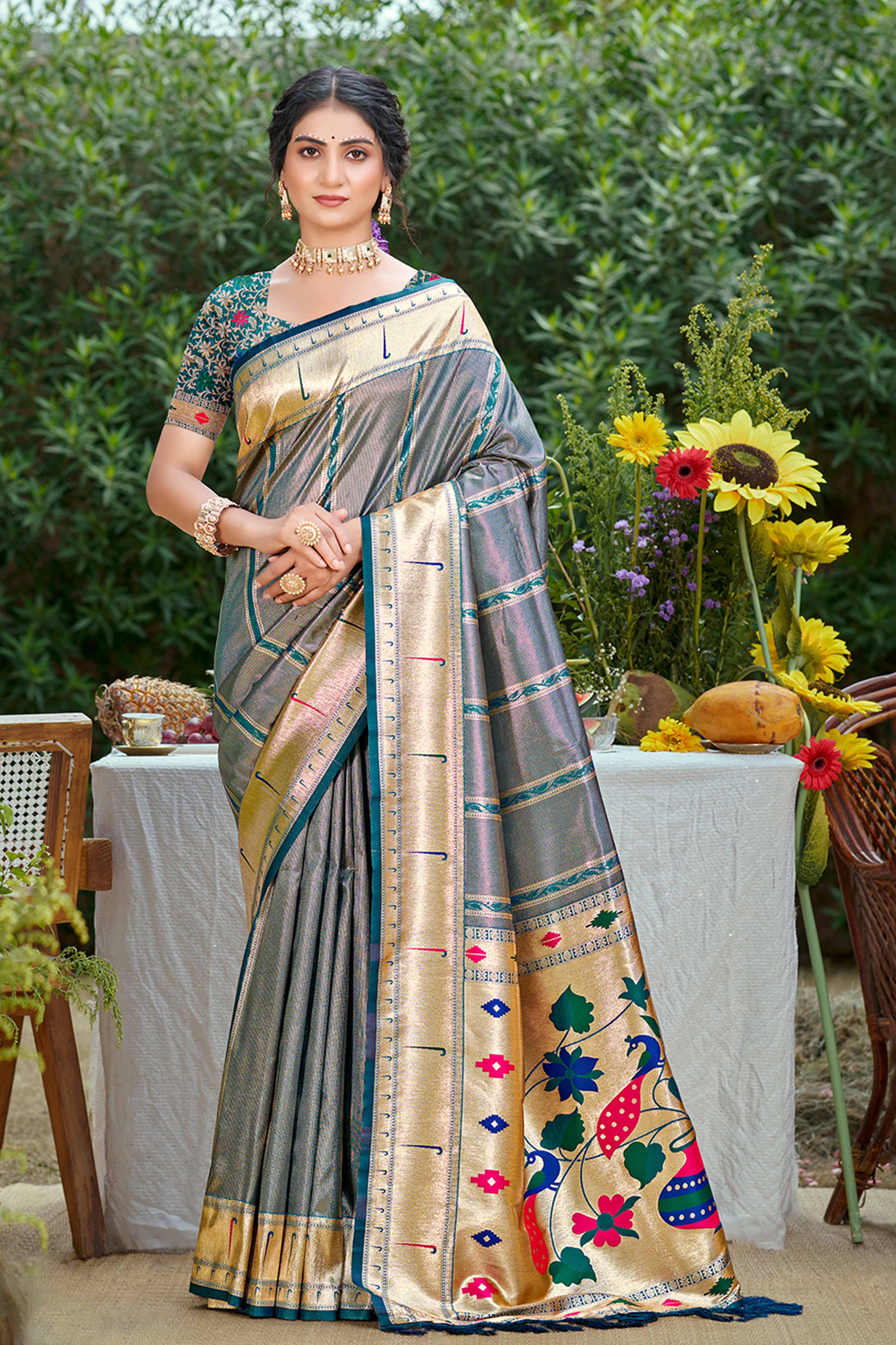 Teal Designer Weaving Silk Blend Saree Accented With Graceful Peacock & Floral Motif Pallu