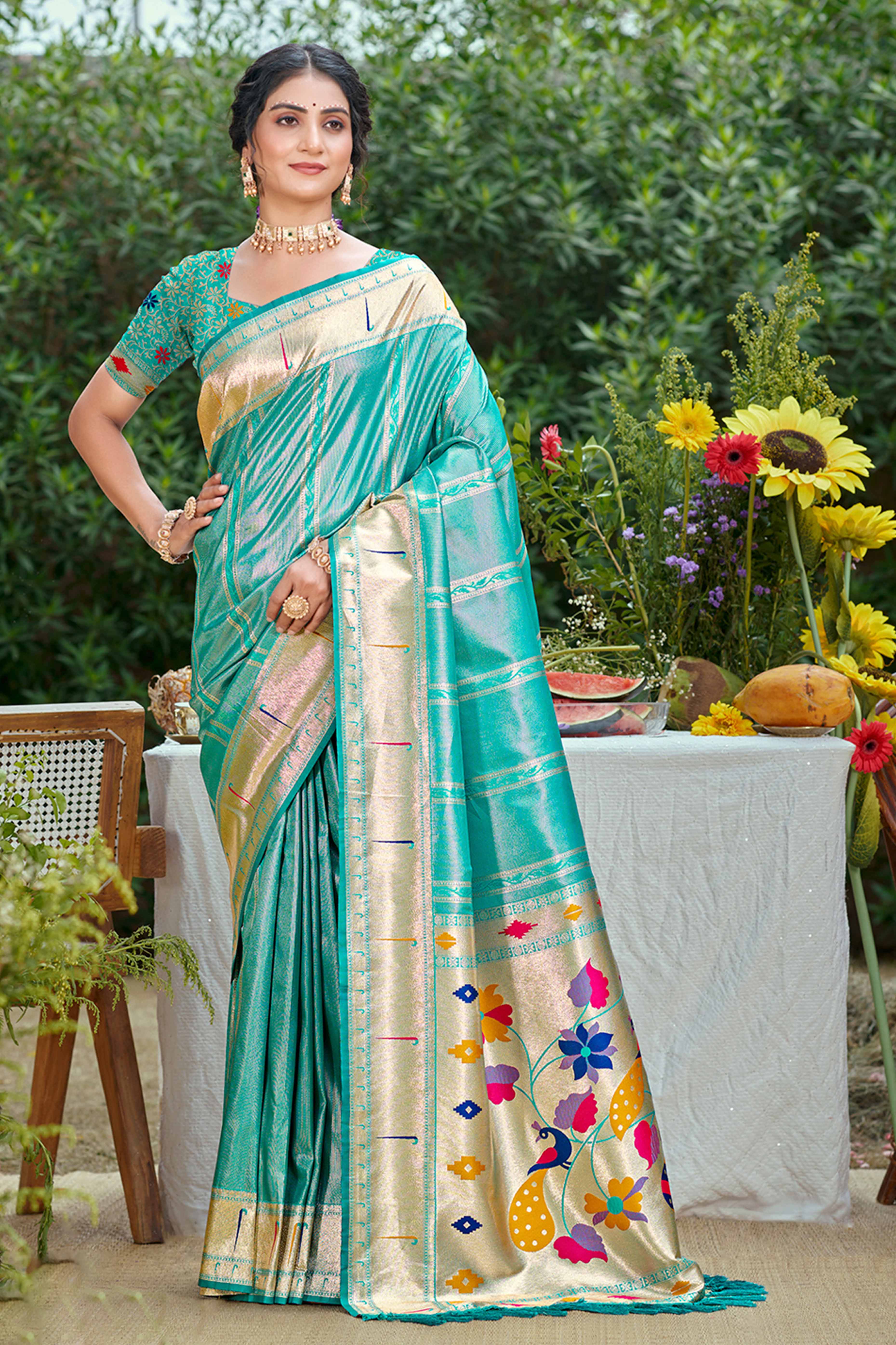 Turquoise Designer Weaving Silk Blend Saree Accented With Graceful Peacock & Floral Motif Pallu