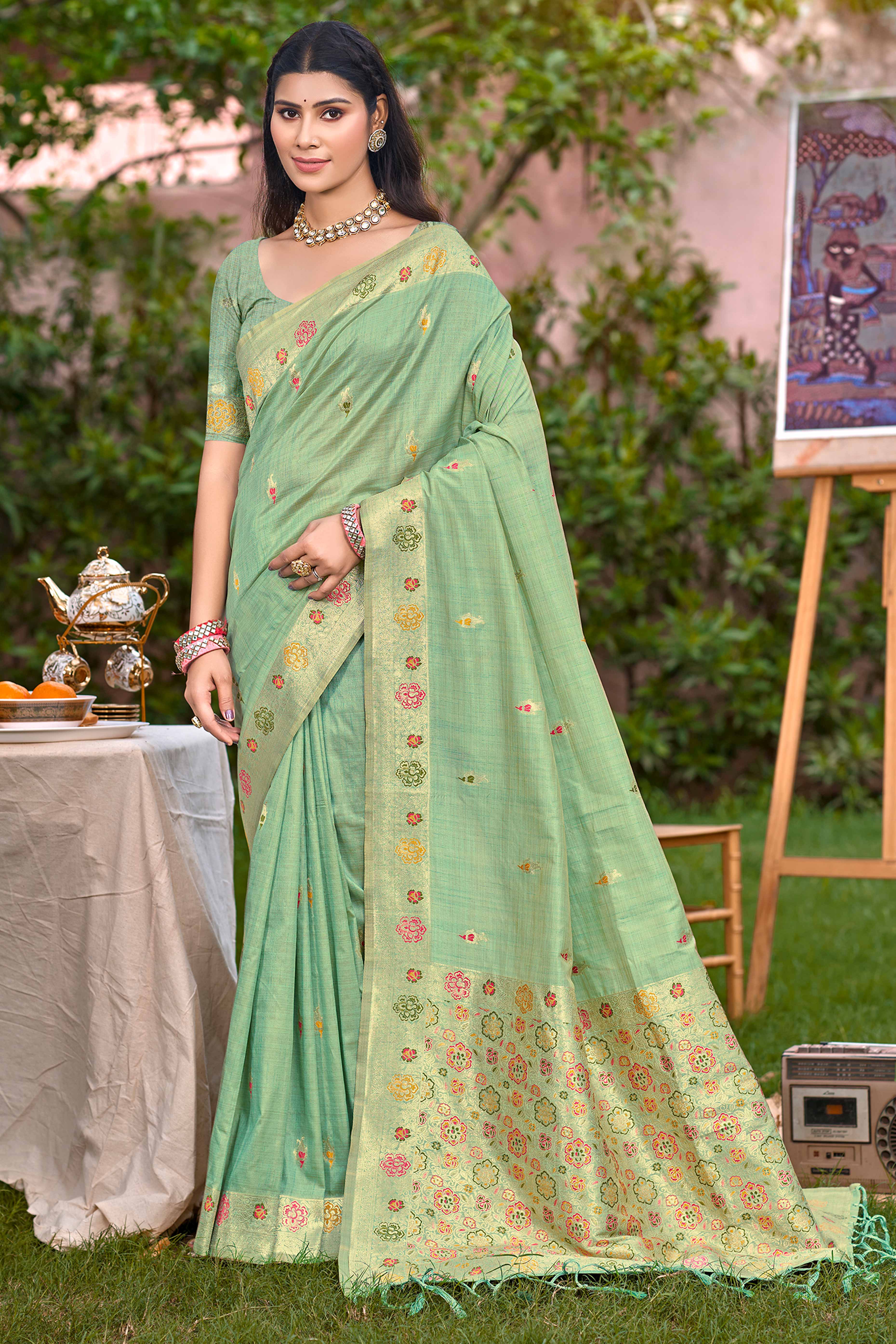 Sea Green Assam Silk Blend Saree Featuring Intricate Floral Zari Weave & Tassel Pallu