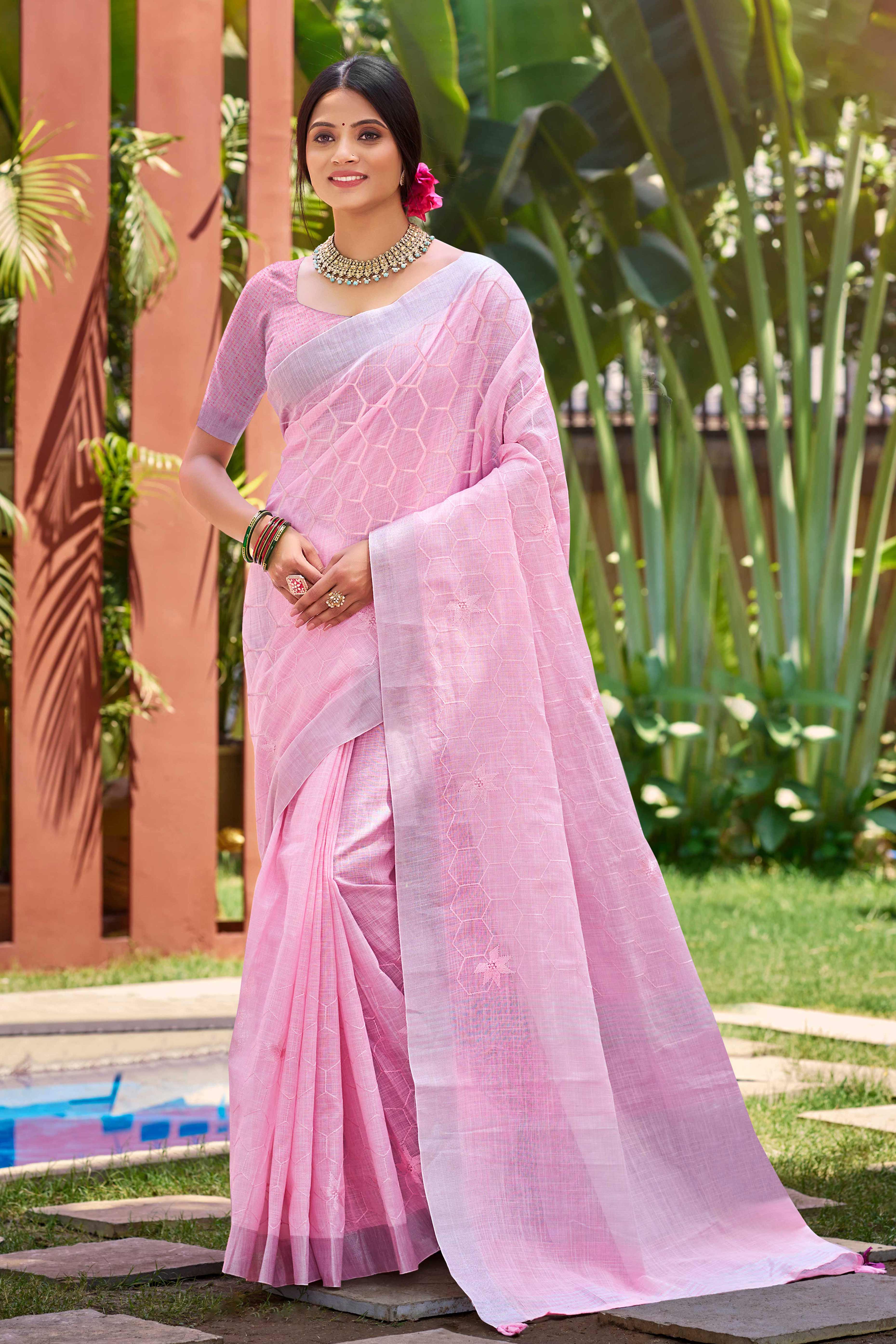 Pink Classic Linen Saree Enhanced With Fine Geometric Embroidery Work & Tassel Pallu