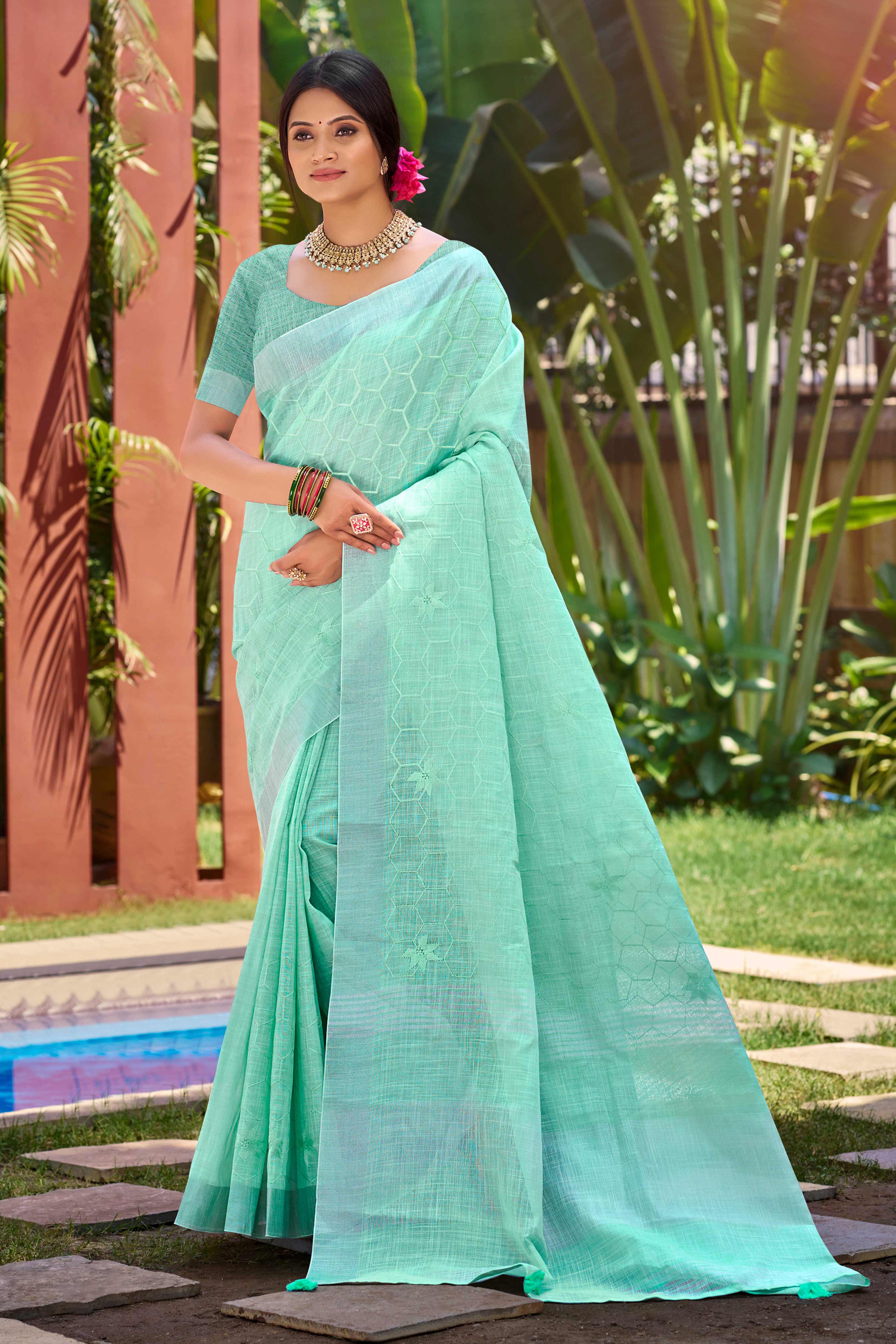 Turquoise Classic Linen Saree Enhanced With Fine Geometric Embroidery Work & Tassel Pallu