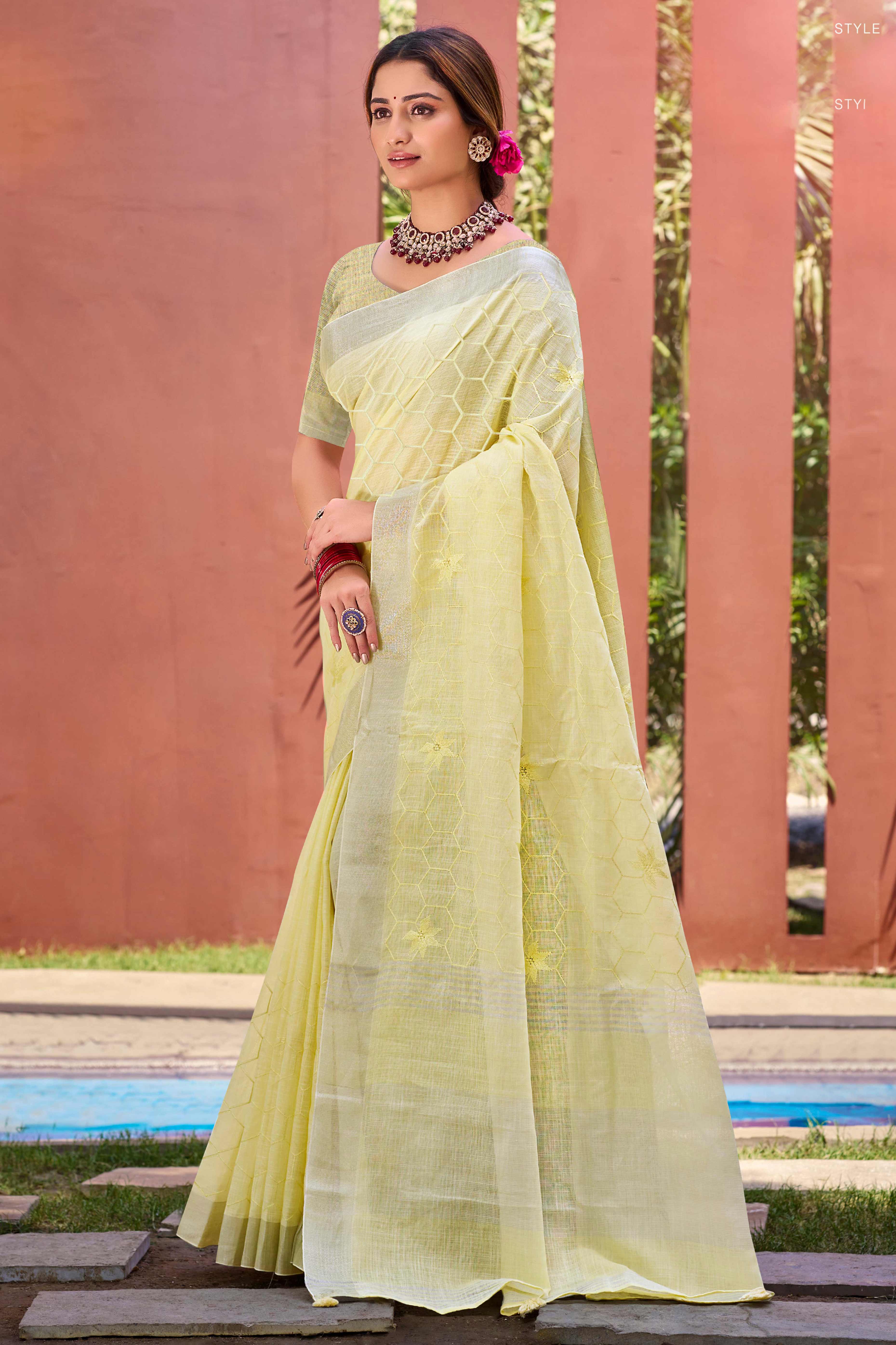 Yellow Classic Linen Saree Enhanced With Fine Geometric Embroidery Work & Tassel Pallu