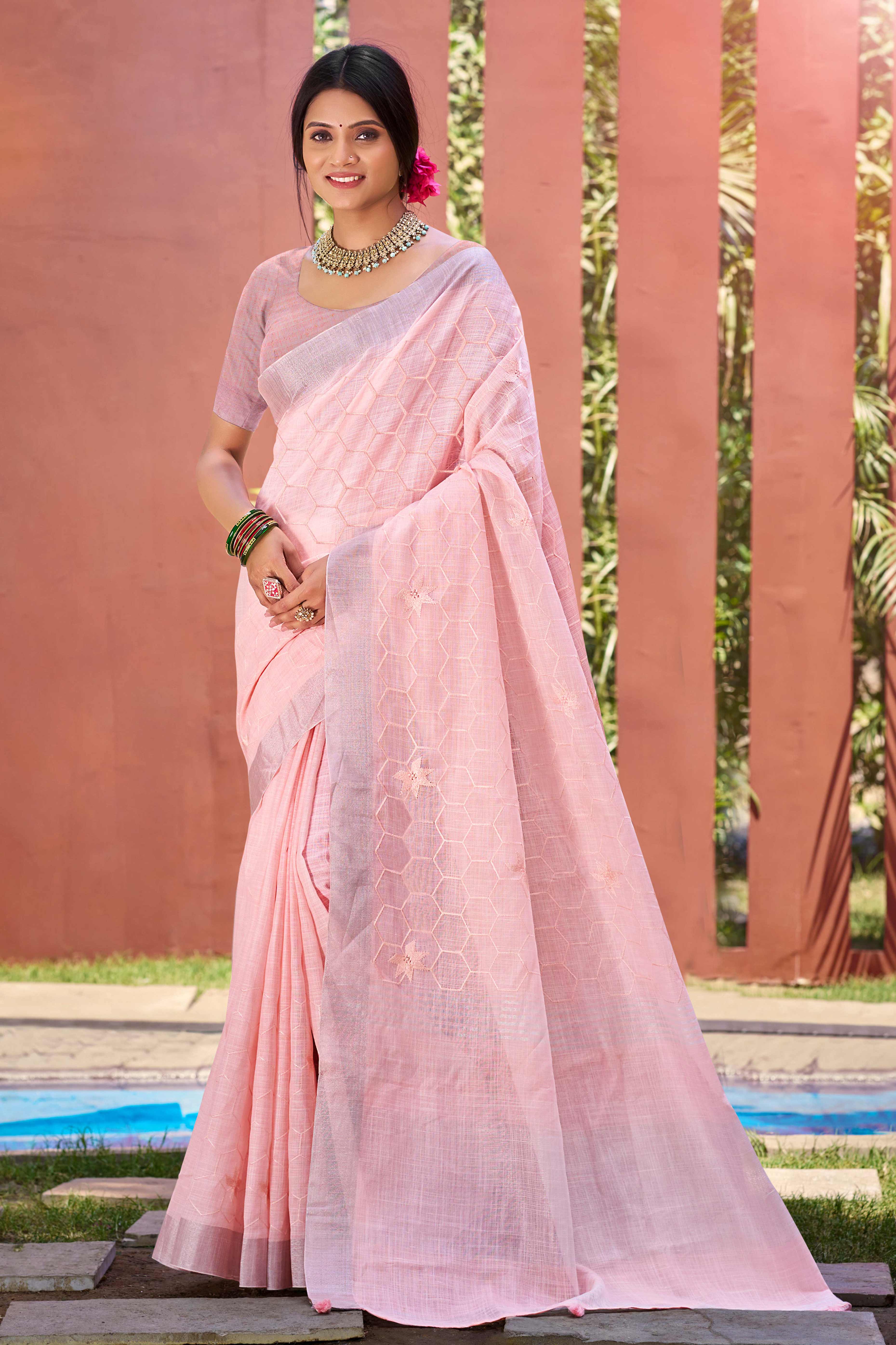 Pink Classic Linen Saree Enhanced With Fine Geometric Embroidery Work & Tassel Pallu