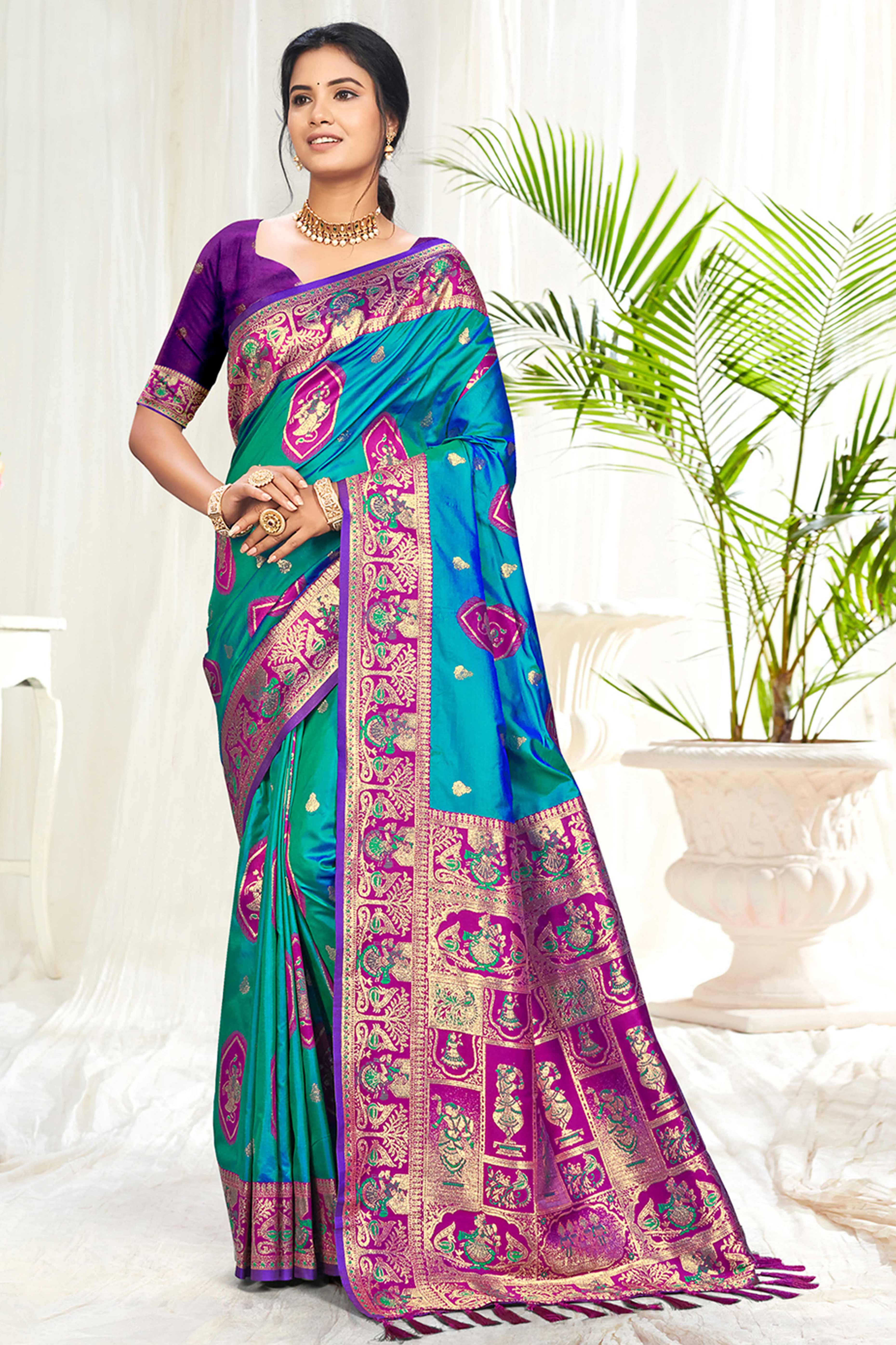 Mesmerizing Morpich Blue Traditional style Weaving Silk Blend Saree With Graceful Tassel Pallu