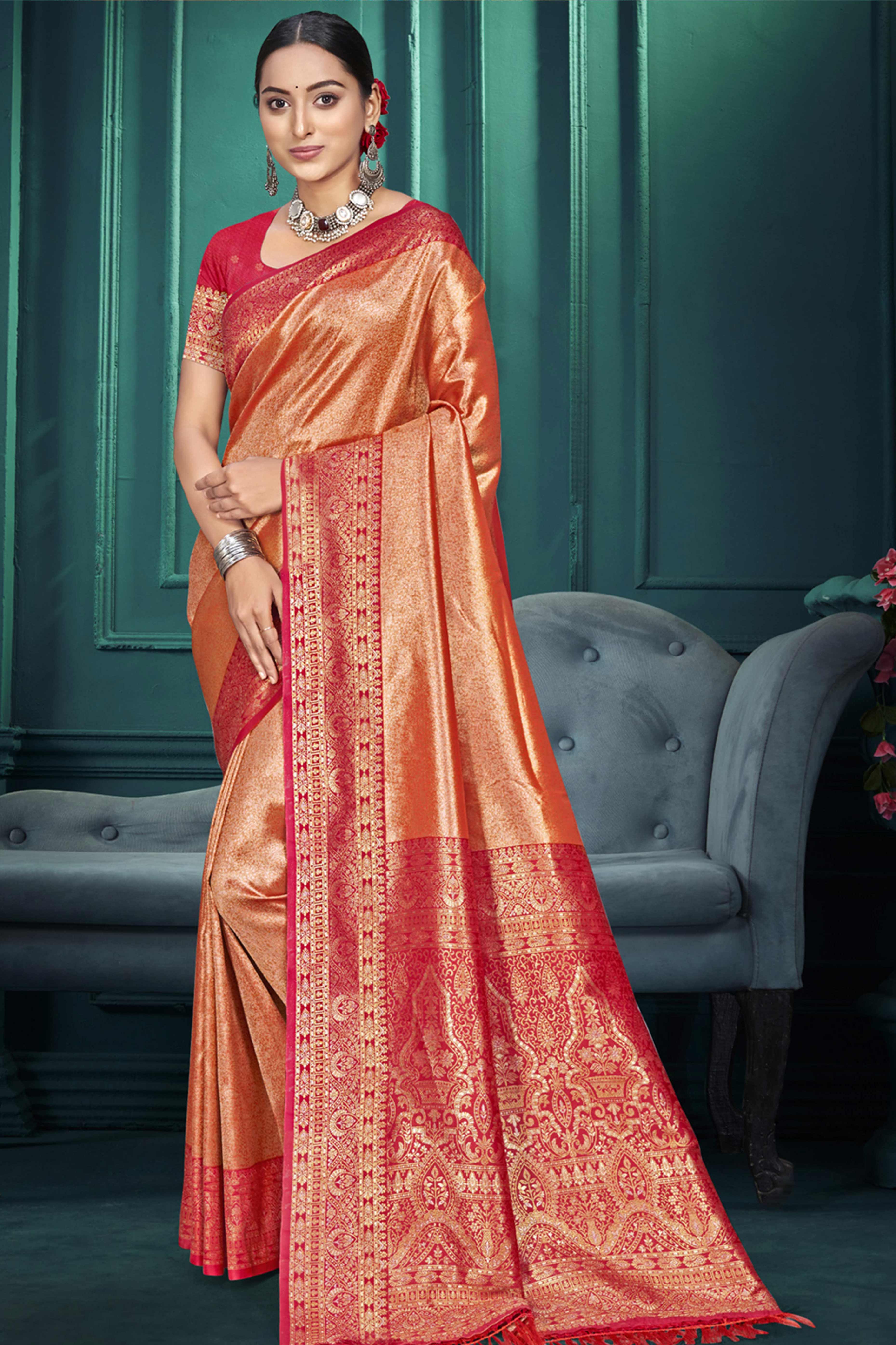 Exclusive Peach Floral Motif Woven Kanjivaram Silk Saree With Graceful Tassel Pallu