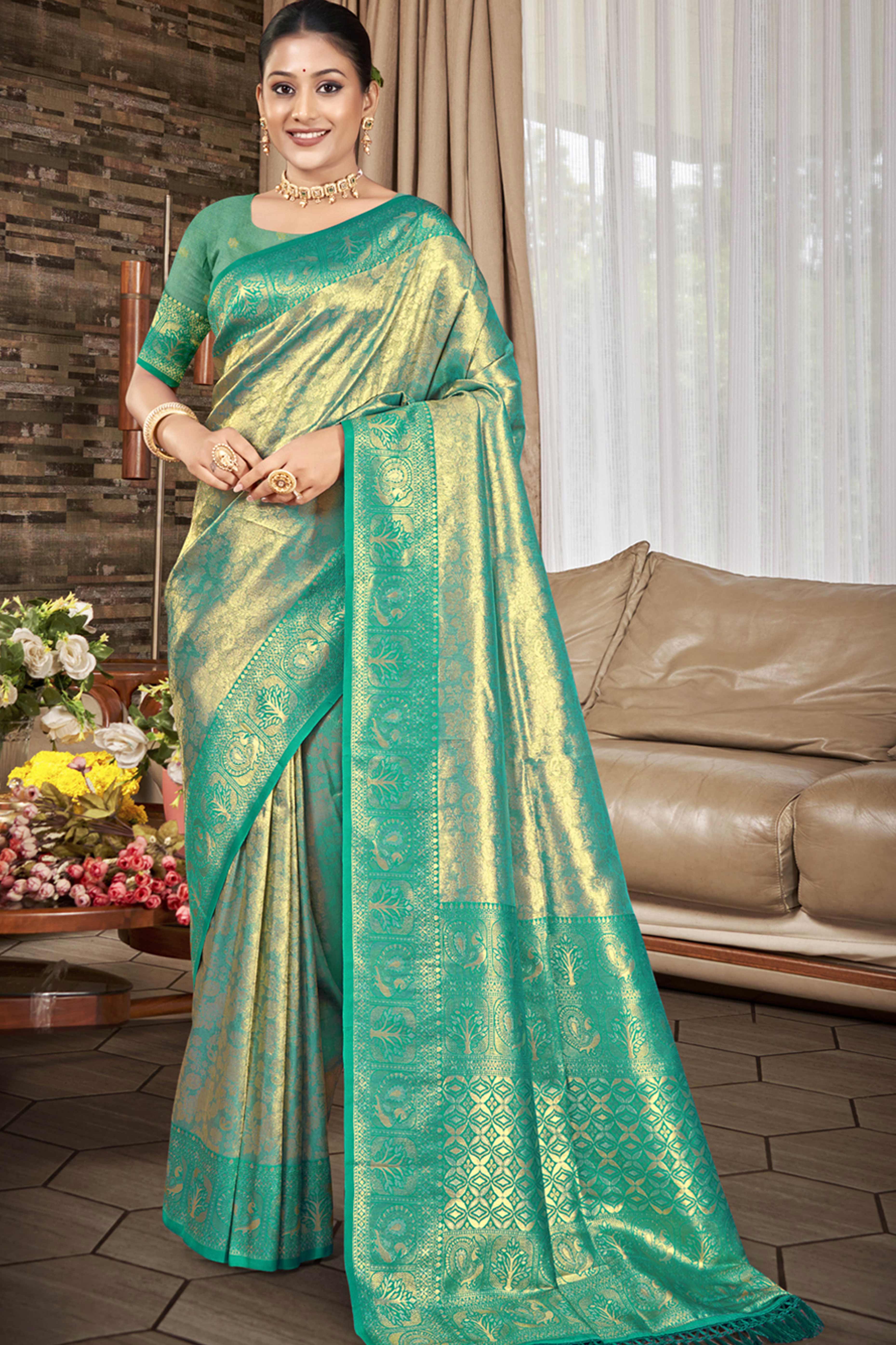 Premium Rama Green Floral and Peacock Motif Woven Kanjivaram Silk Saree With Tassel Pallu