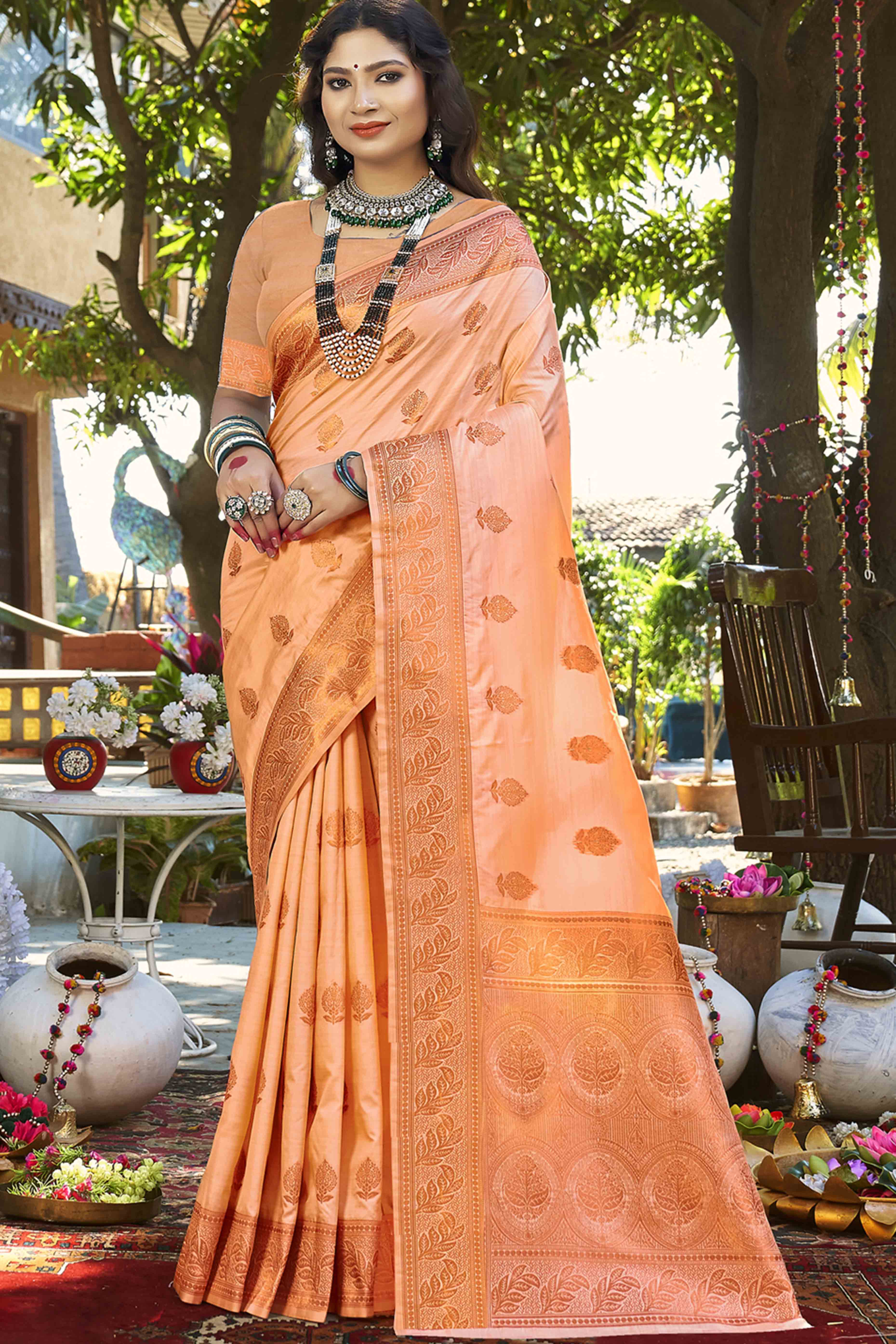 Graceful Emerald Floral Zari Woven Banarasi Silk Saree In Peach