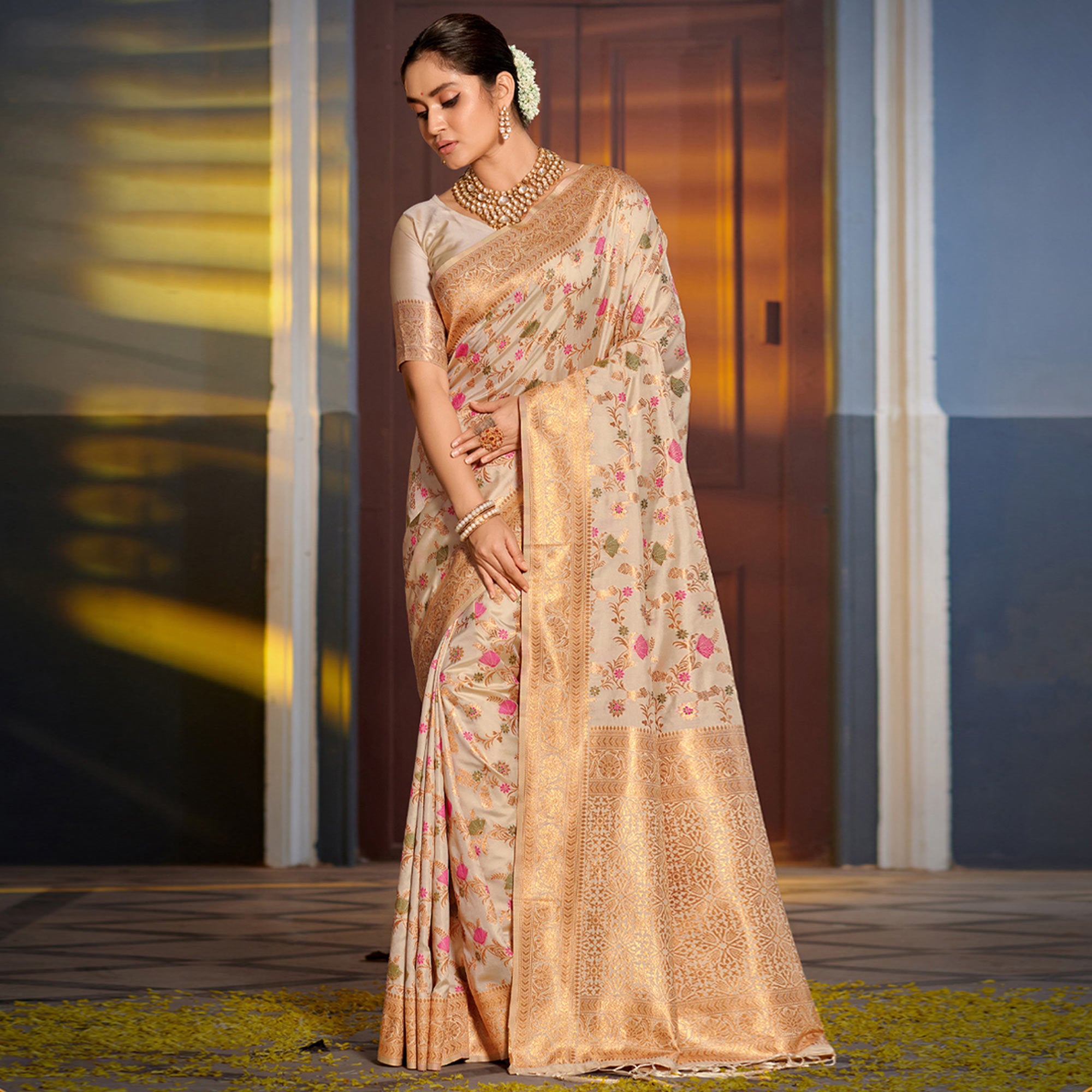 Cream Floral Woven Banarasi Silk Saree With Tassels