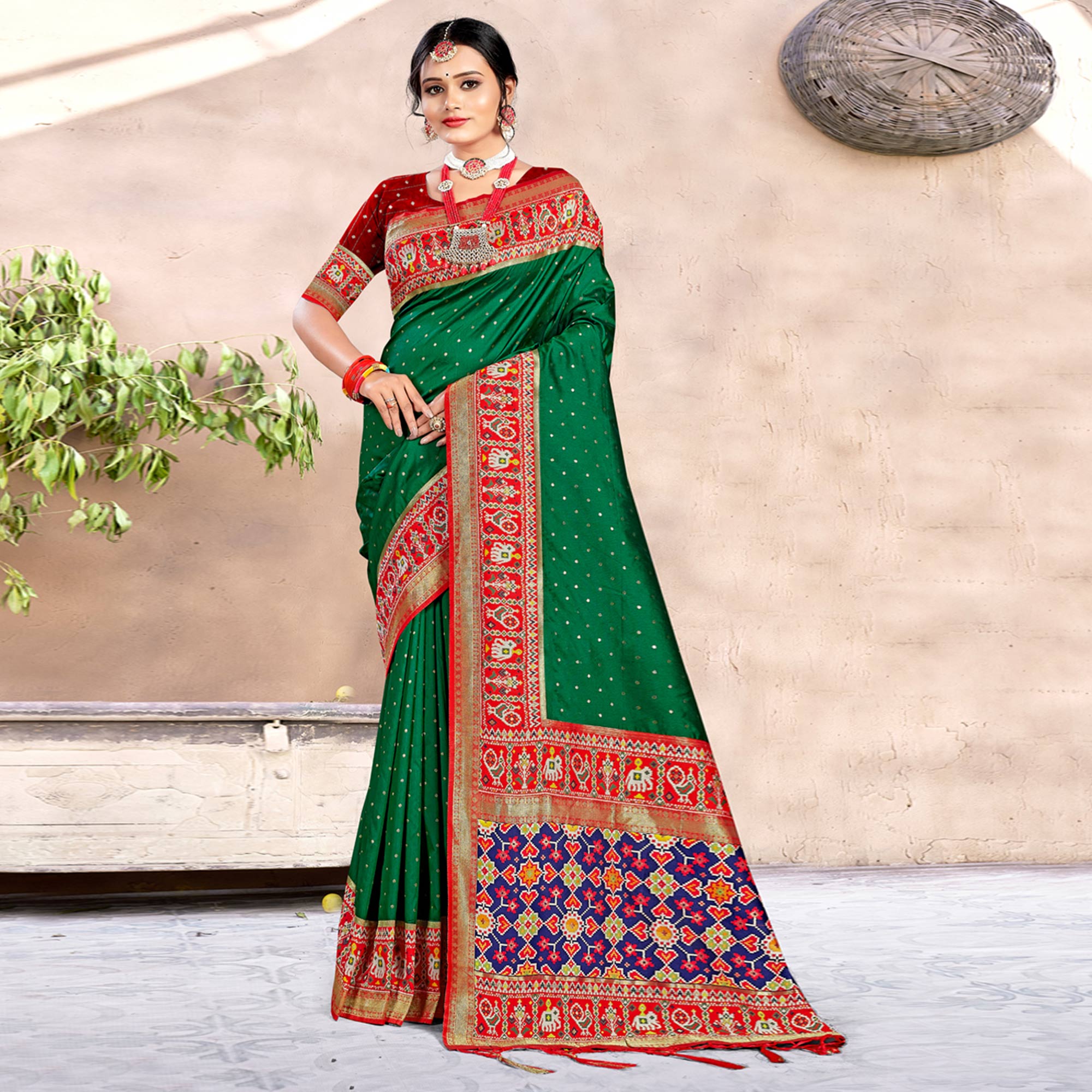 Green Woven Patola Banarasi Silk Saree With Tassels