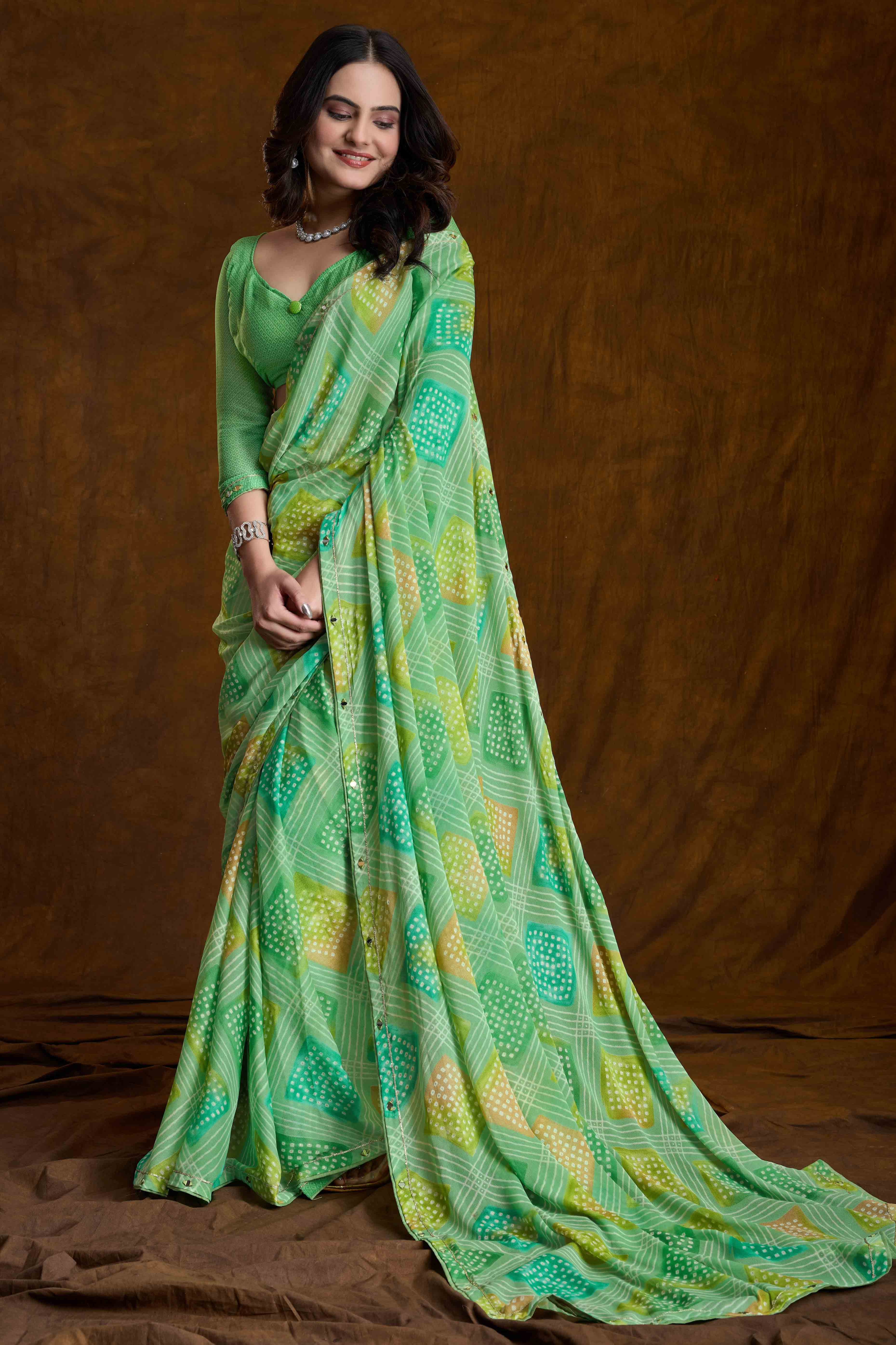 Green Bandhani Printed Chiffon Saree With Sparkling Mirror Work Border