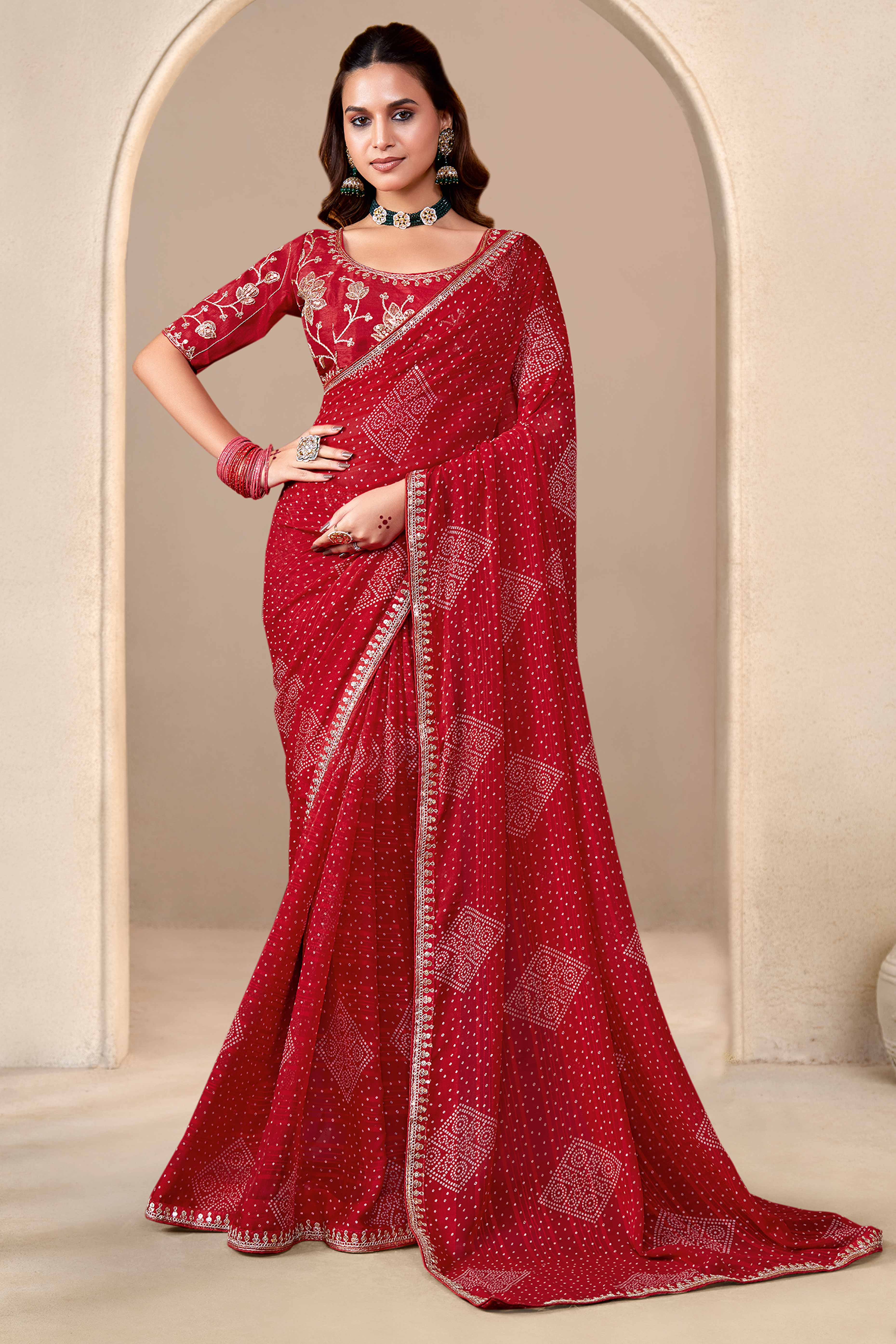 Red Bandhani Printed Georgette Saree Enhanced With Sequins & Cording Embroidered Lace Border