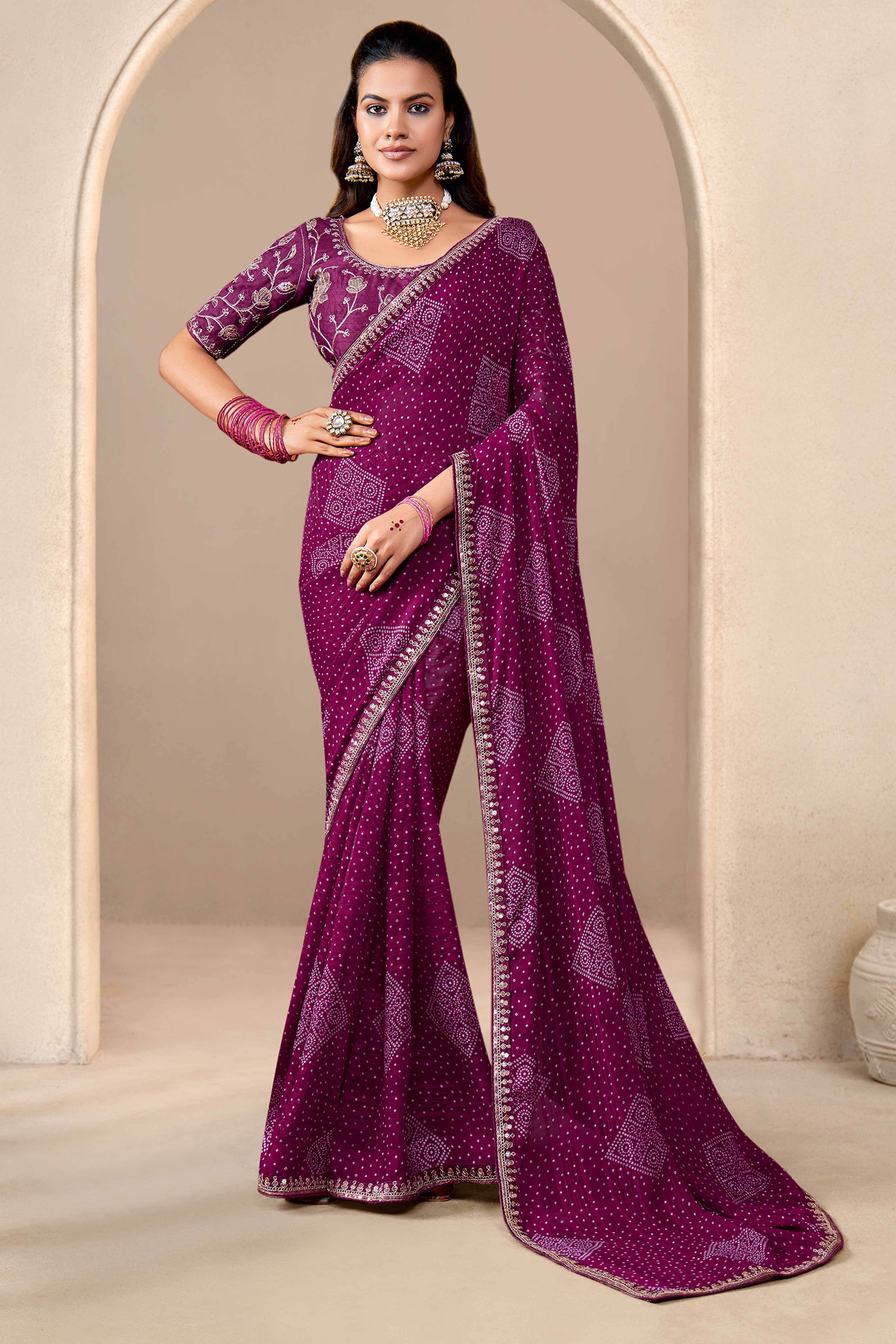 Wine Bandhani Printed Georgette Saree Enhanced With Sequins & Cording Embroidered Lace Border