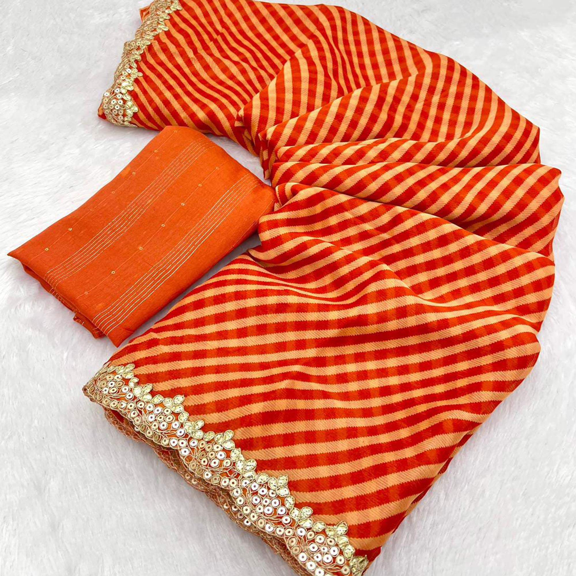 Orange Striped Printed Chiffon Saree With Sequins Embroidered Border