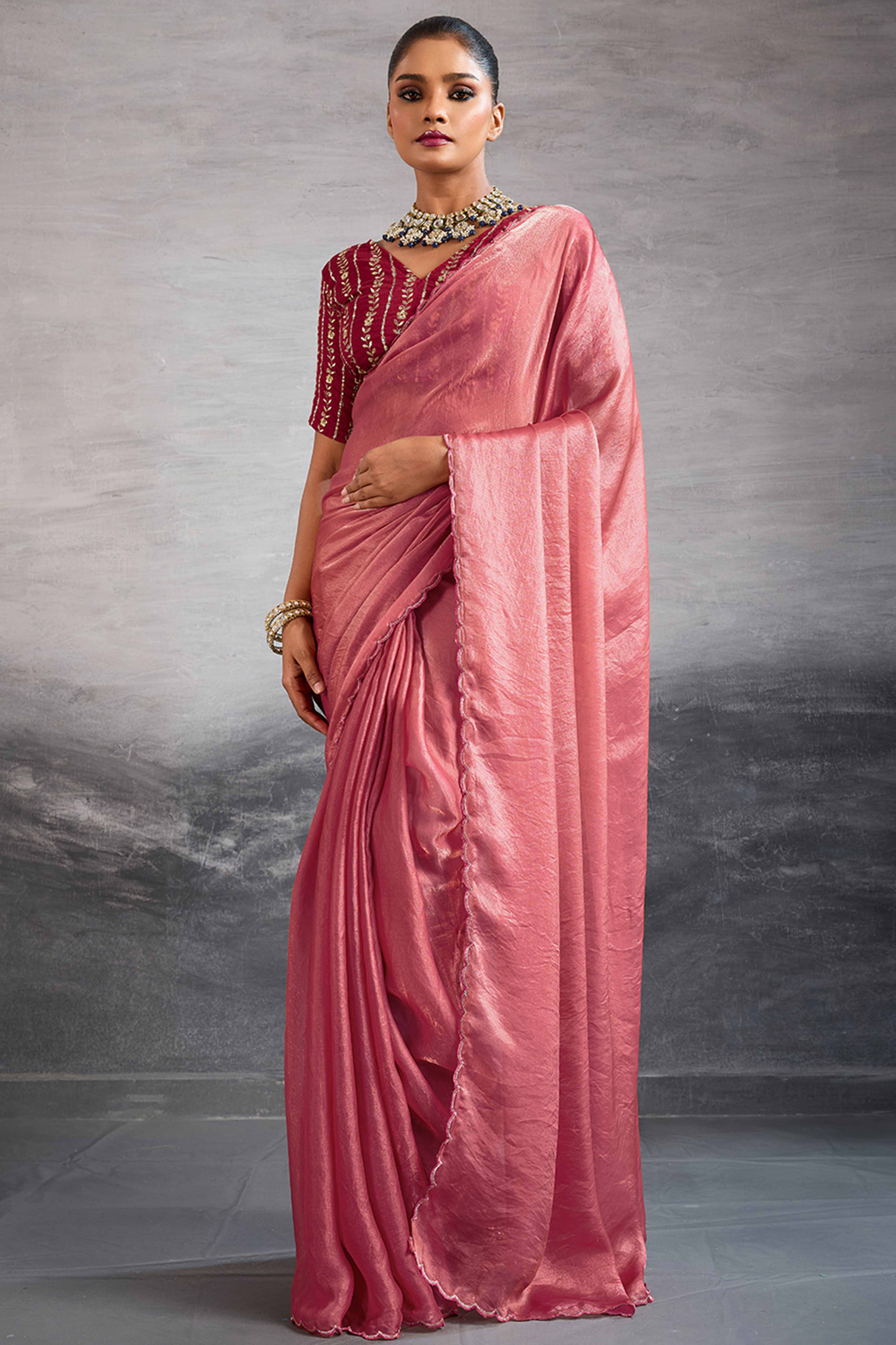 Coral Pink Solid Organza Jimmy Choo Saree Accentuated With Elegant Cutwork Border Detailing