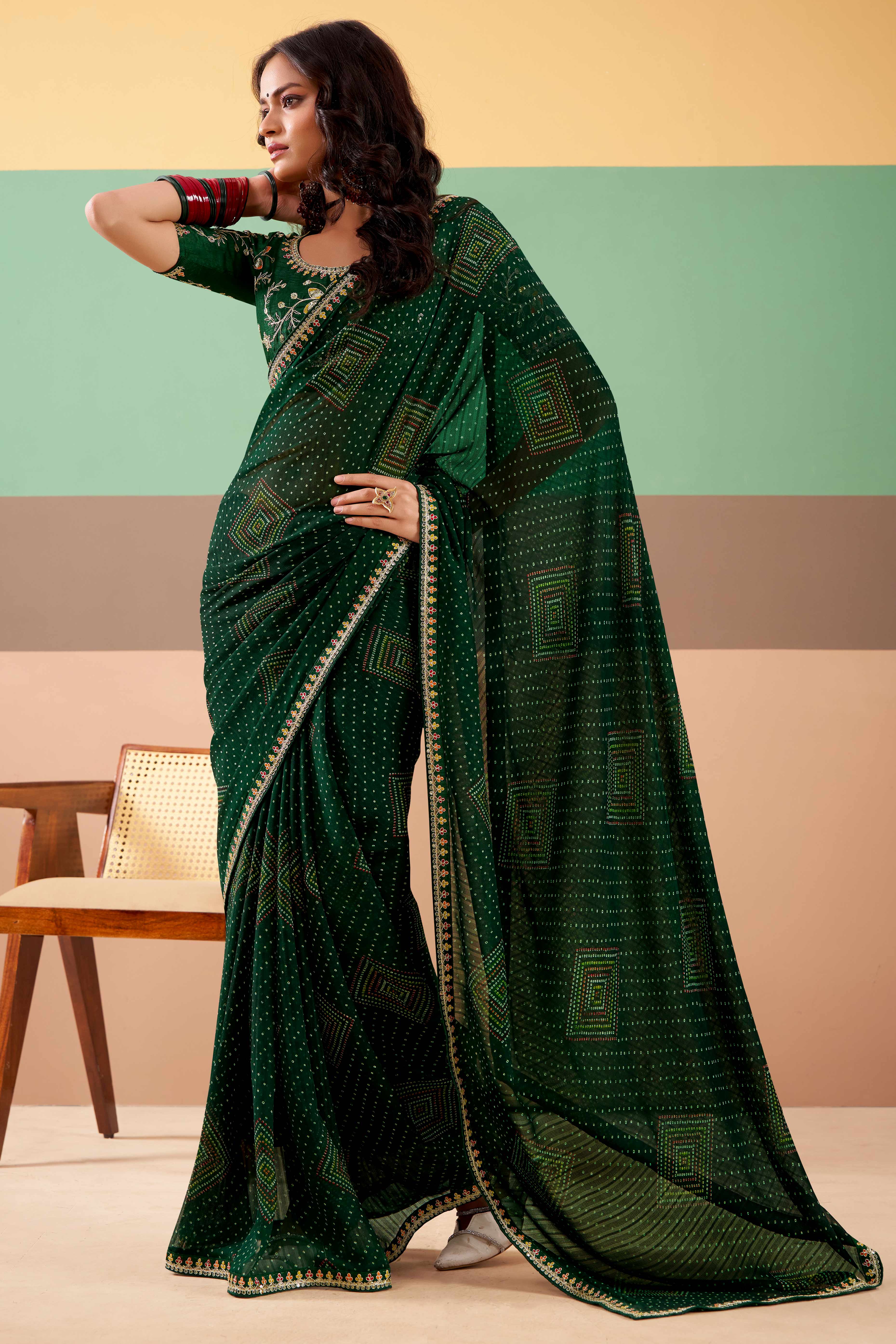 Charming Bottle Green Bandhani Printed Georgette Saree Adorned With Cording Embroidered Border