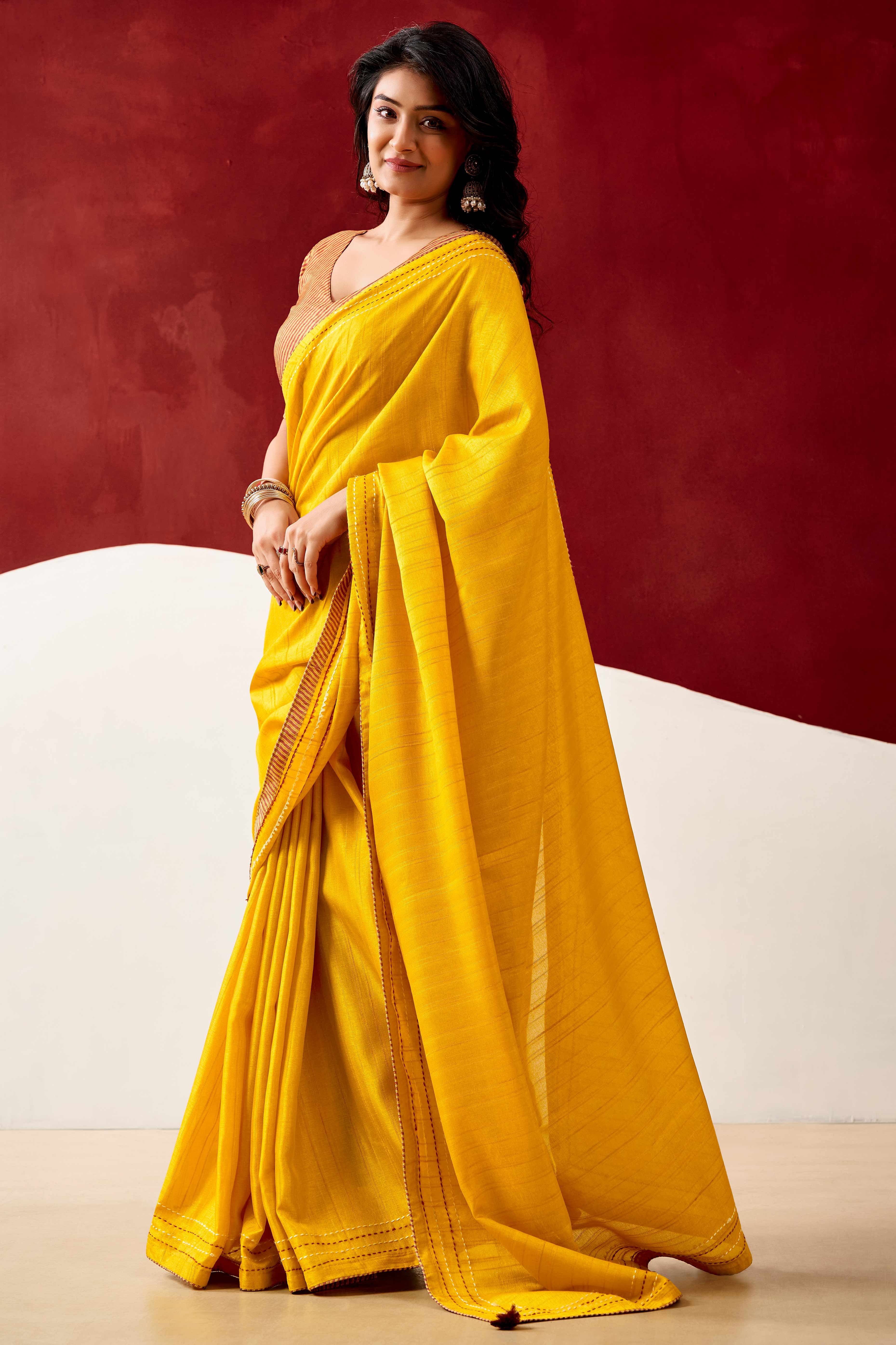 Graceful Yellow Handloom Cotton Blend Saree Featuring Striped Lining Embroidery & Tassel Pallu