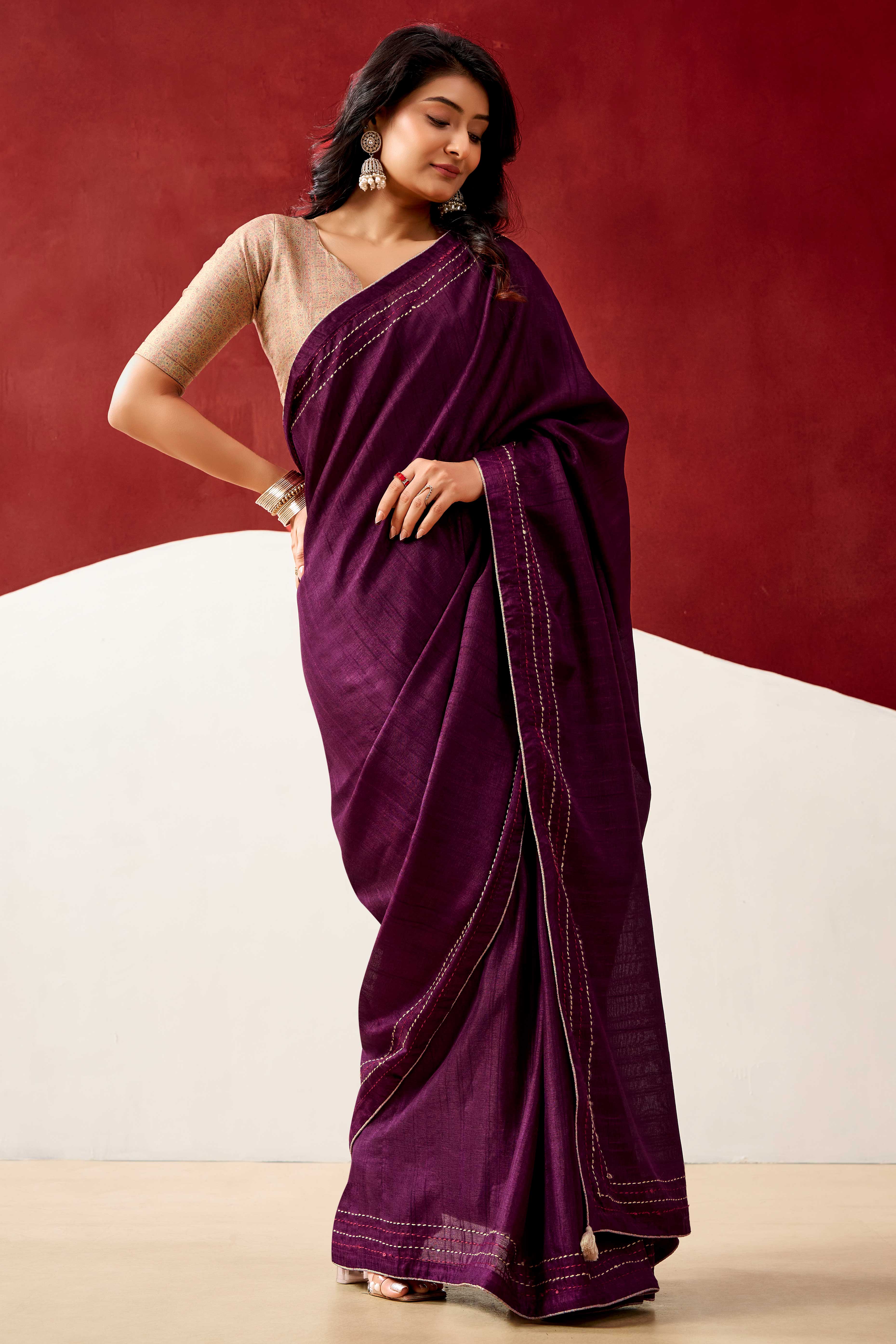 Graceful Wine Handloom Cotton Blend Saree Featuring Striped Lining Embroidery & Tassel Pallu