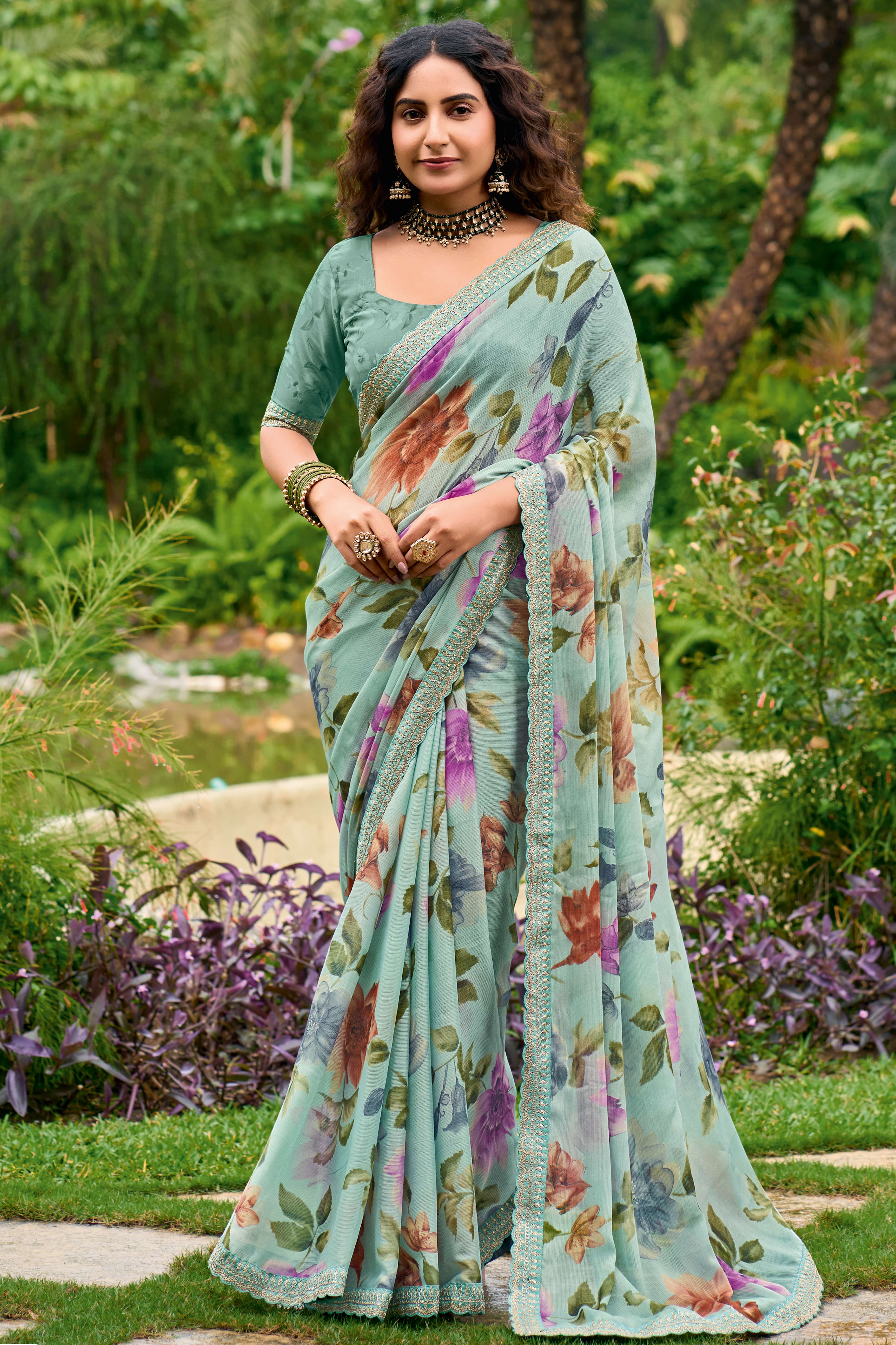 Sea Green Floral Chiffon Saree Enhanced with Fine Embroidery on the Border