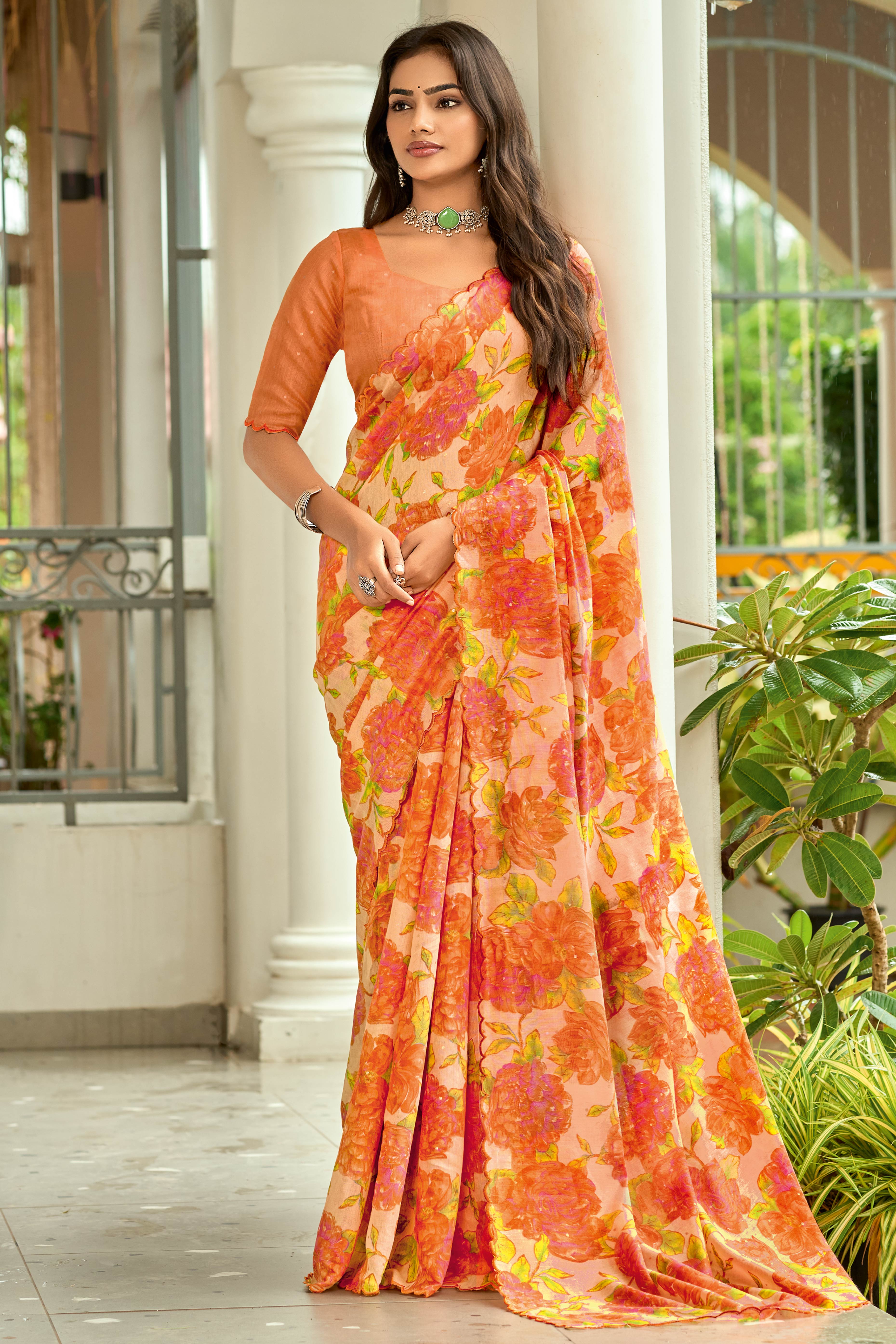 Peach Floral Printed Silk Blend Saree Enhanced with Intricate Stone Detailing
