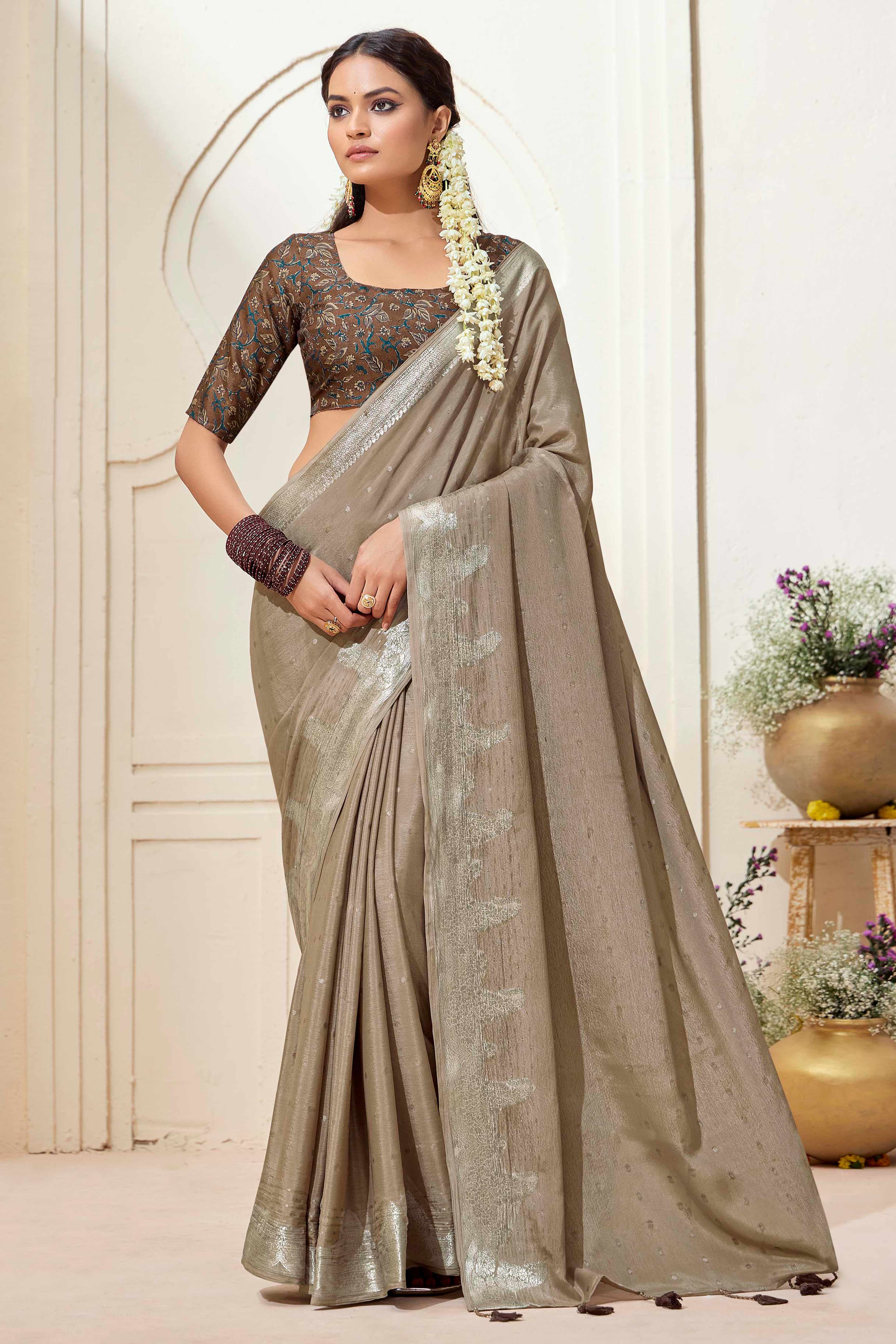 Beige Chinon Saree with Jacquard Weaving and Delicate Tassel Accents