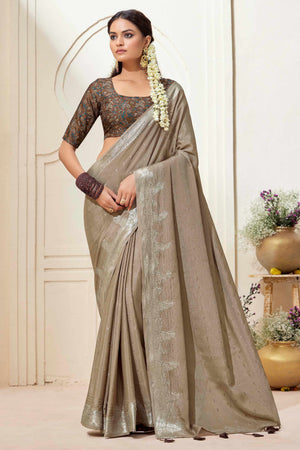 Beige Chinon Saree with Jacquard Weaving and Delicate Tassel Accents