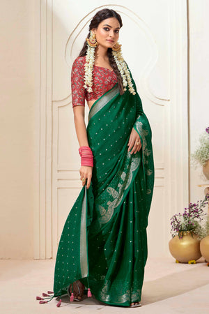 Green Chinon Saree with Jacquard Weaving and Delicate Tassel Accents