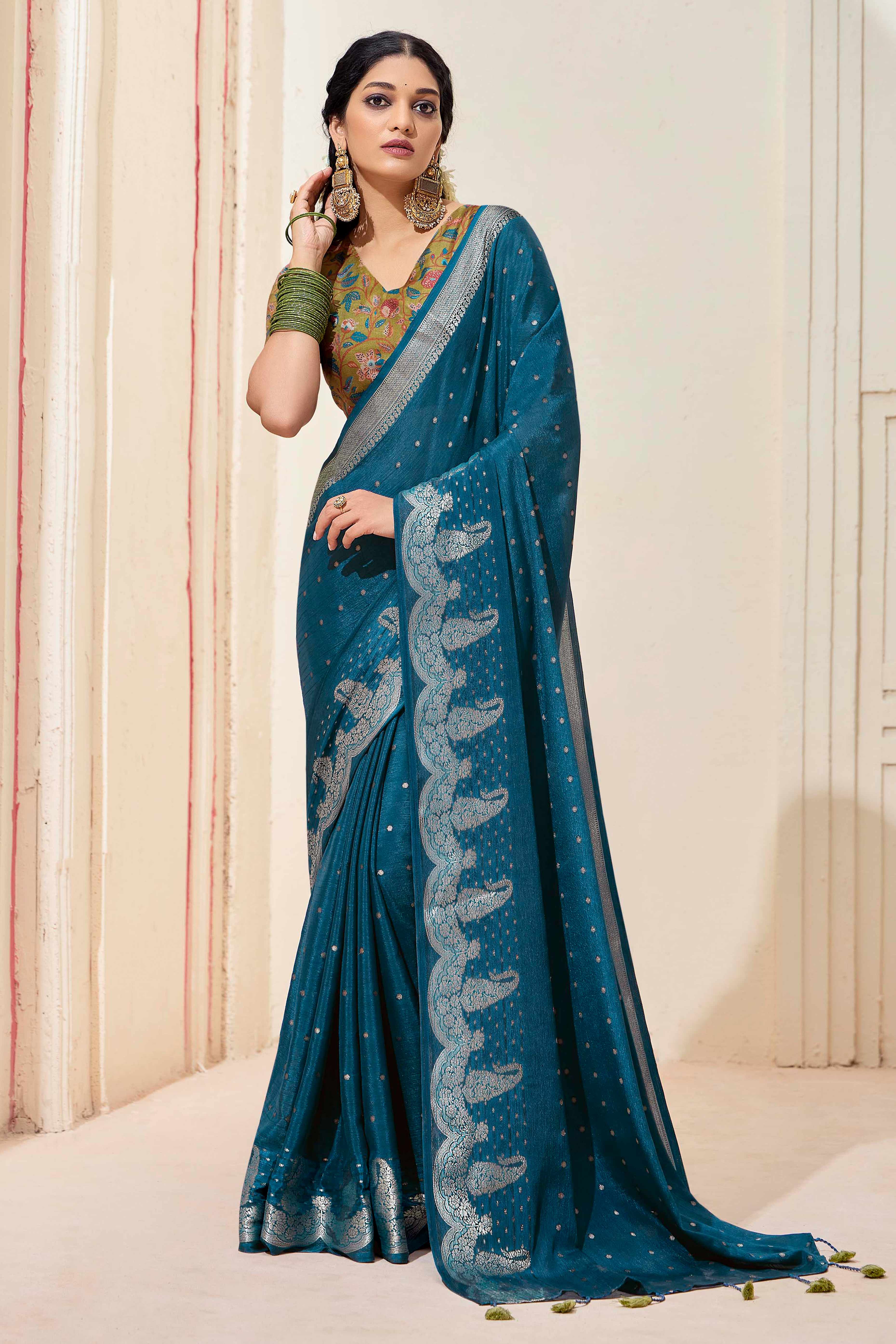 Teal Chinon Saree with Jacquard Weaving and Delicate Tassel Accents