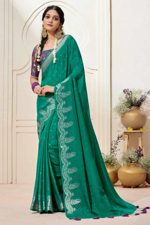 Rama Green Chinon Saree with Jacquard Weaving and Delicate Tassel Accents