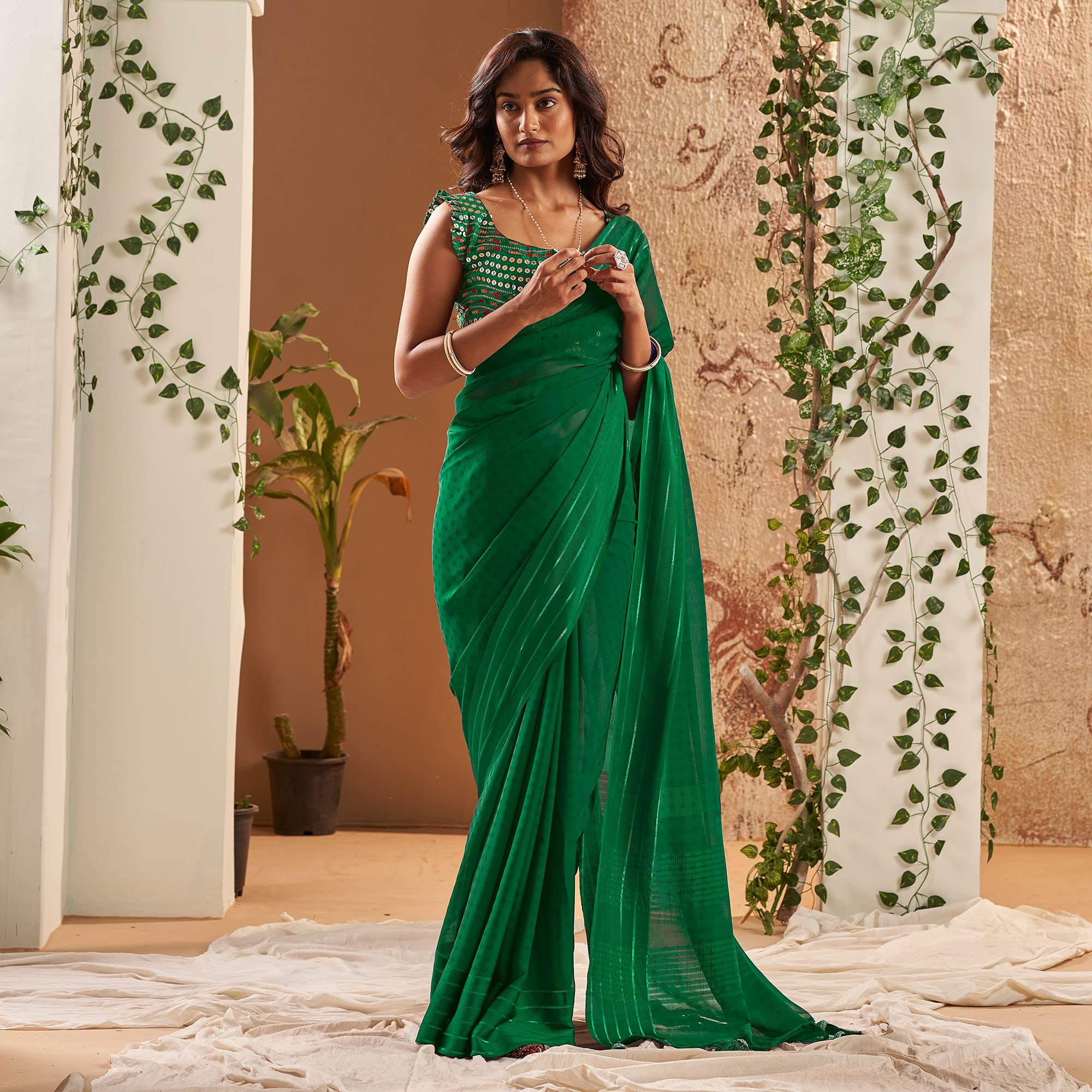 Green Woven Georgette Saree With Tassels