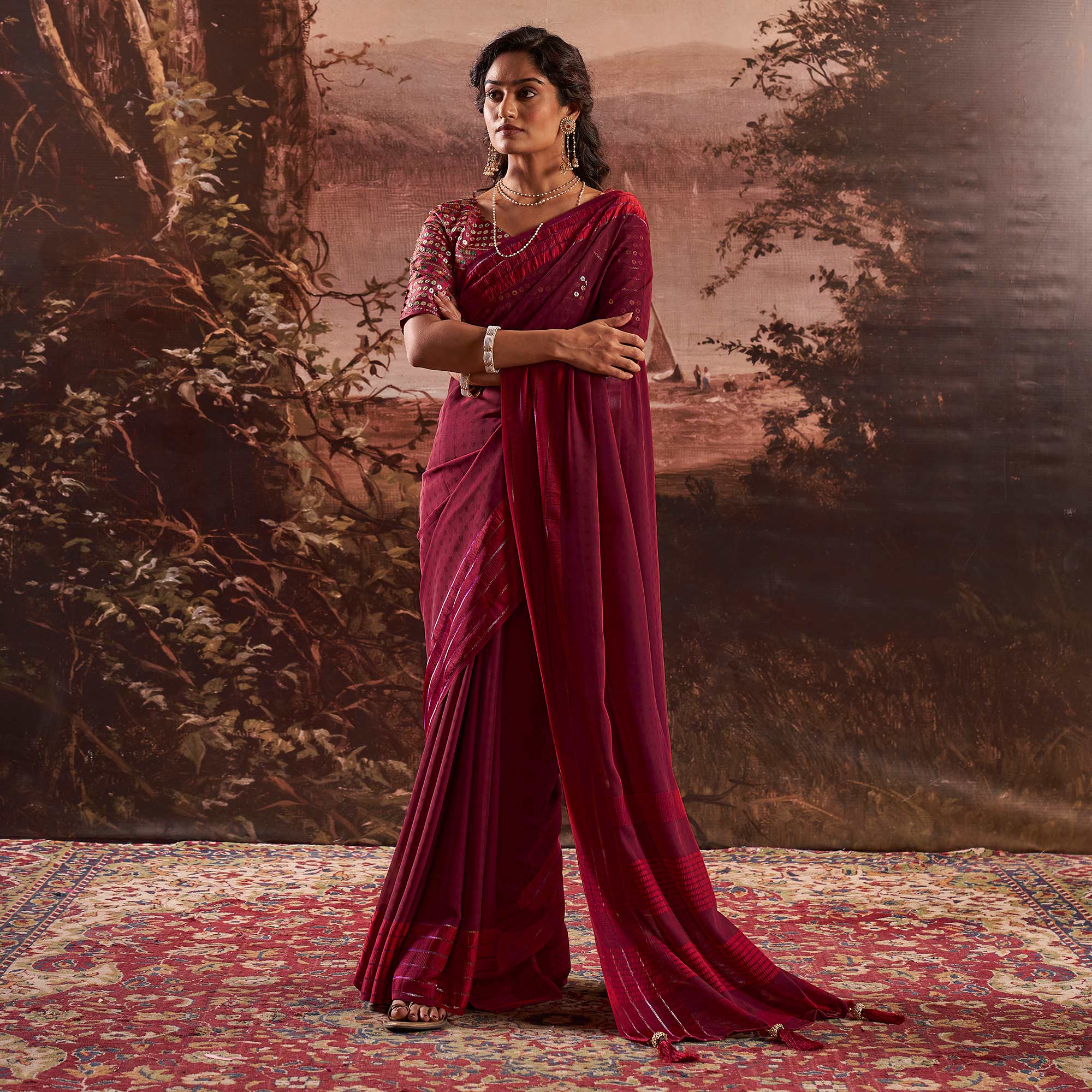 Wine Woven Georgette Saree With Tassels