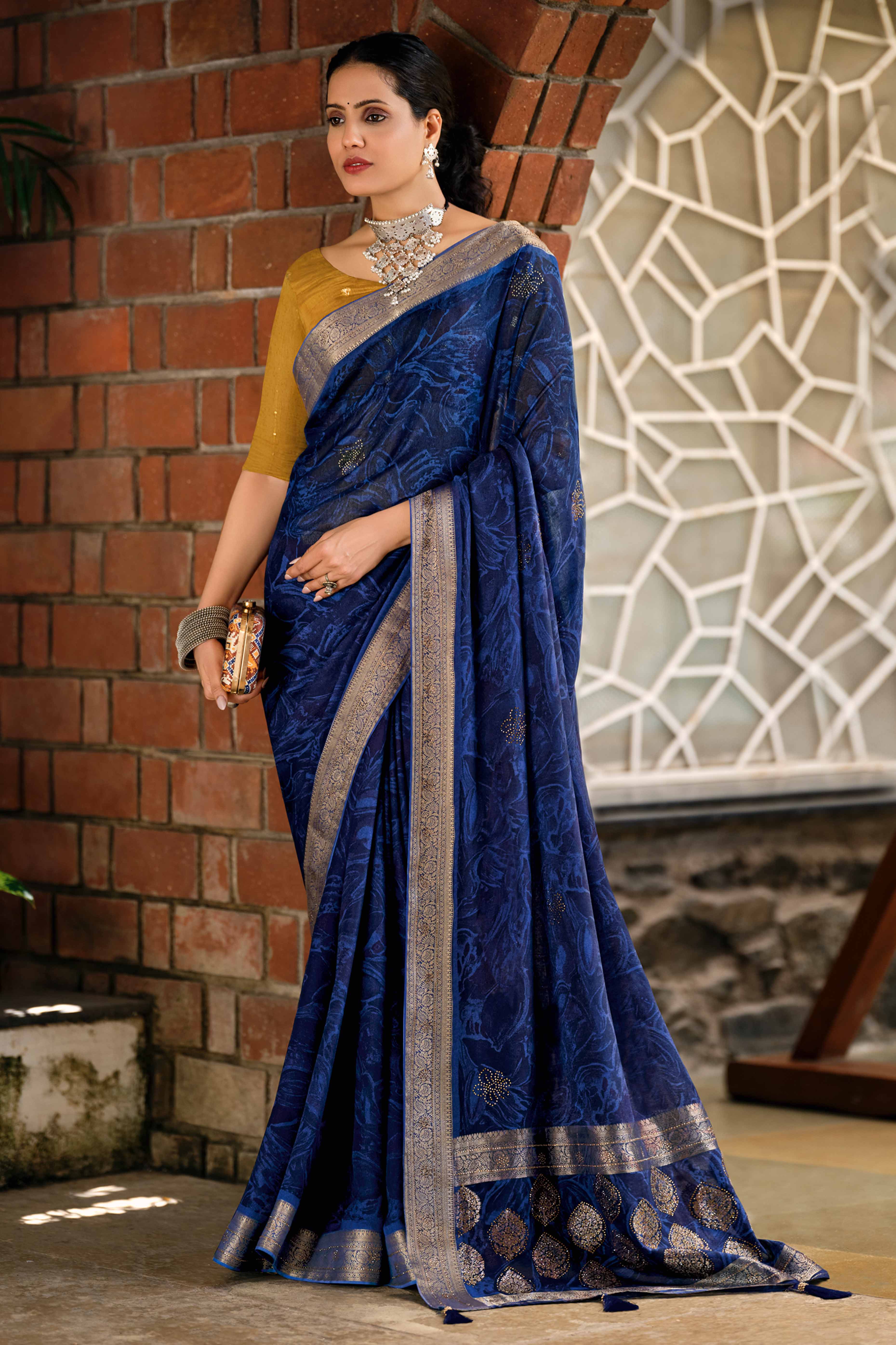 Navy Blue Abstract Printed Georgette Saree Enhanced with Subtle and Shiny Stone Work