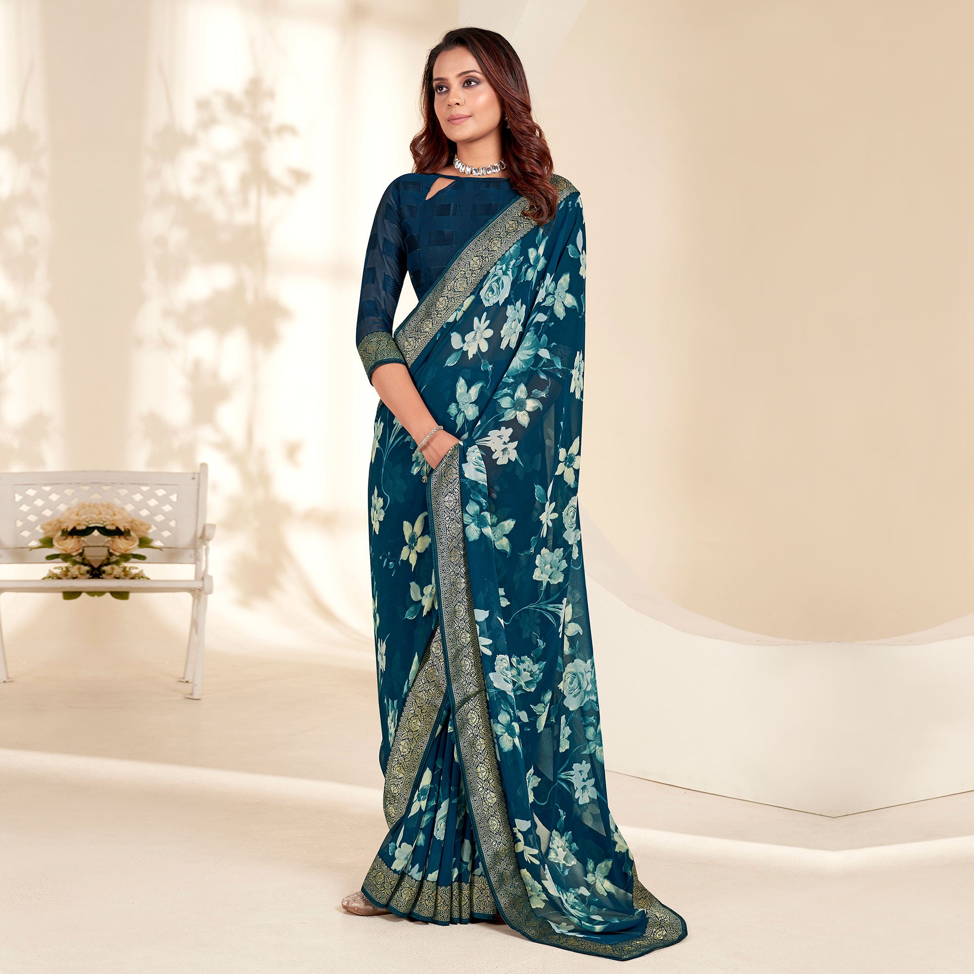 Teal Floral Printed Georgette Saree With Embroidered Border