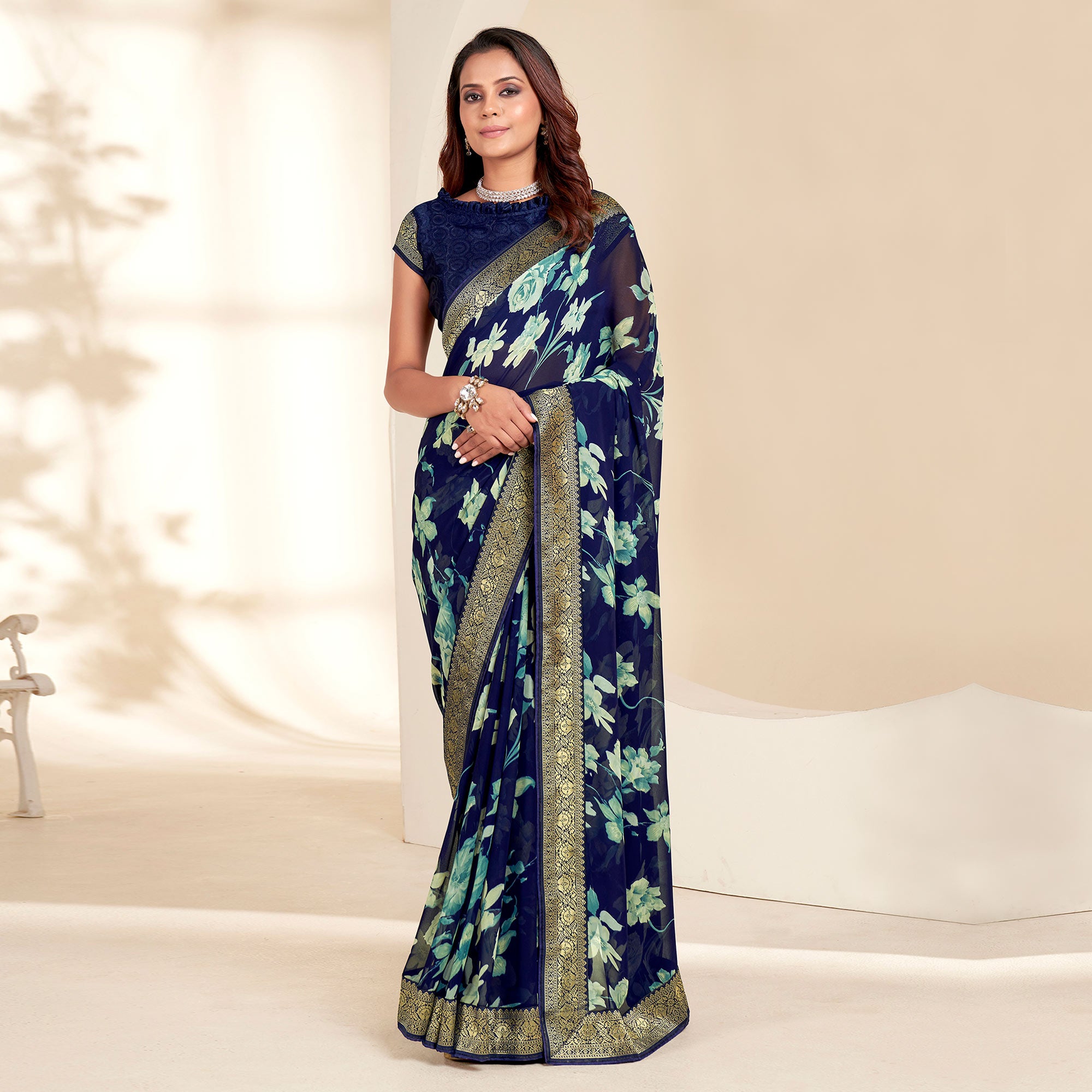 Blue Floral Printed Georgette Saree With Embroidered Border