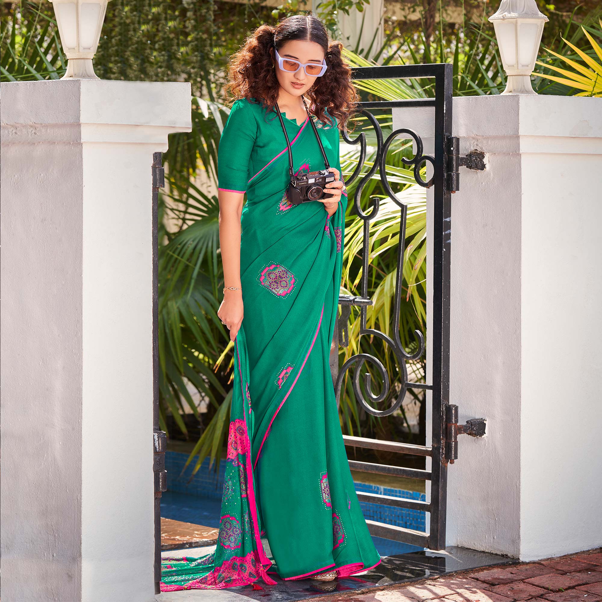 Rama Green Foil Printed Georgette Saree With Tassels