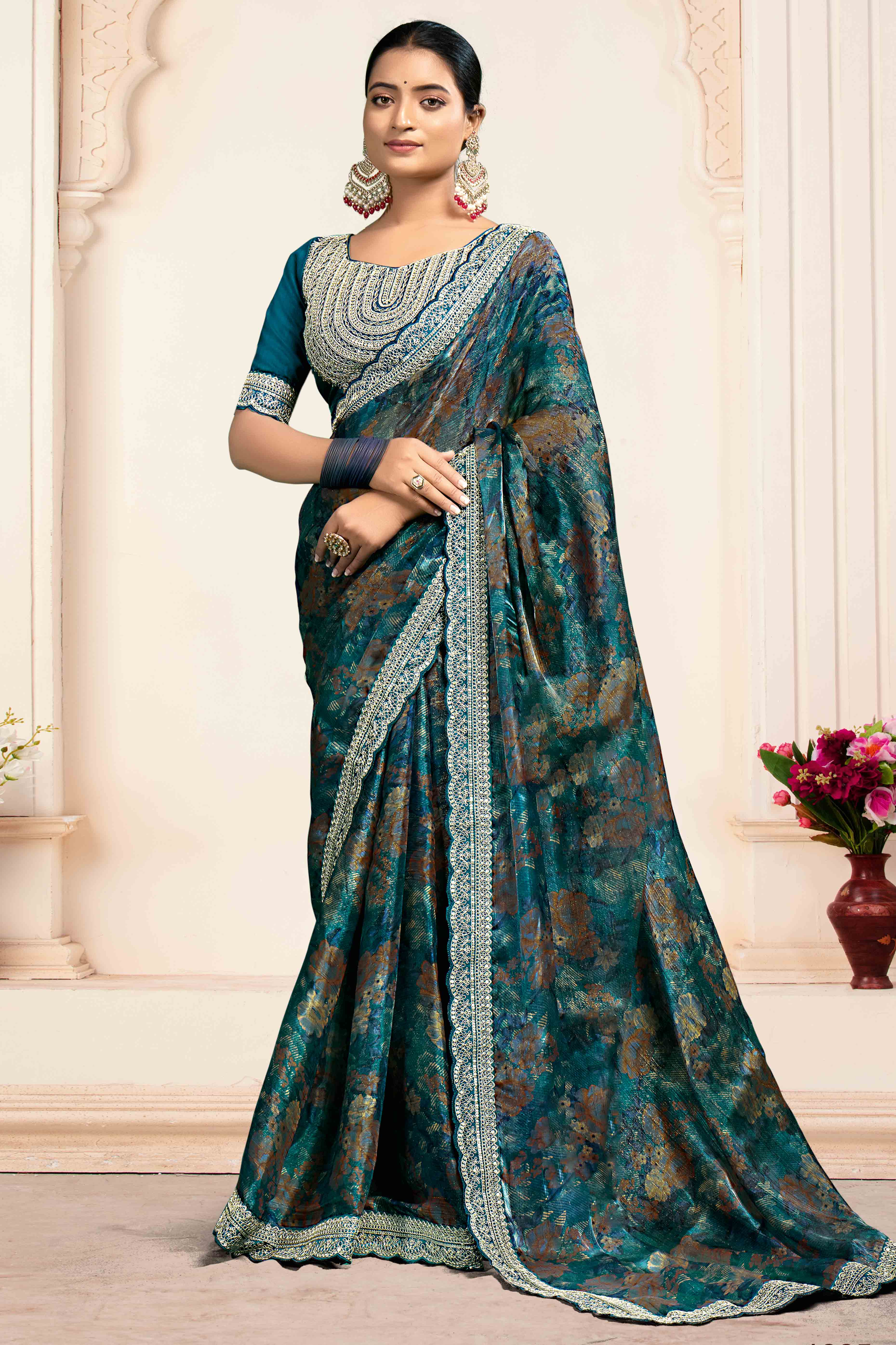 Teal Floral Printed Jimmy Choo Chiffon Saree With Embroidery On Border