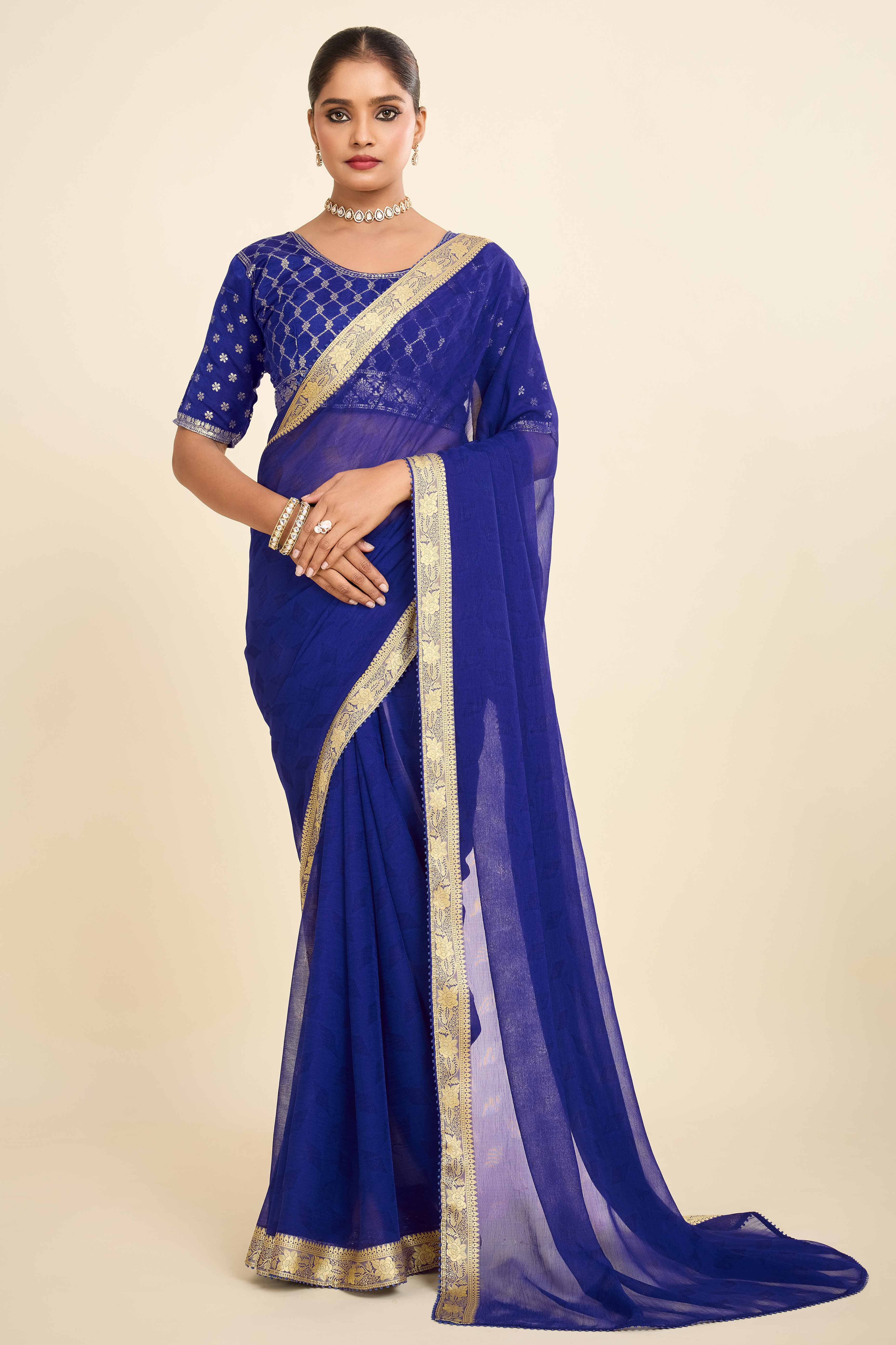 Blue Printed Chiffon Saree with Intricate Woven Edging