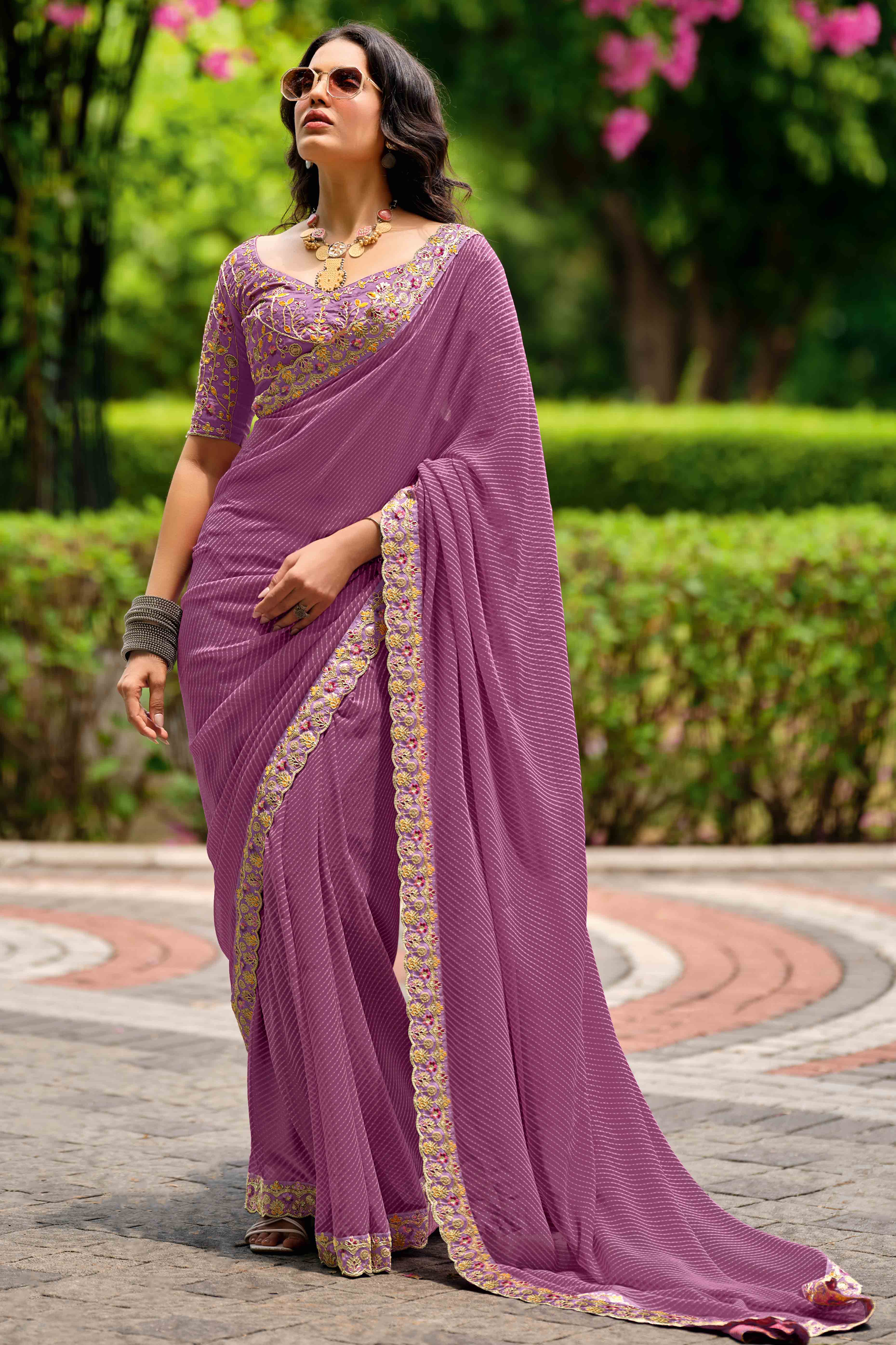 Lavender Striped Printed Georgette Saree With Shimmering Sequin Embroidered Border