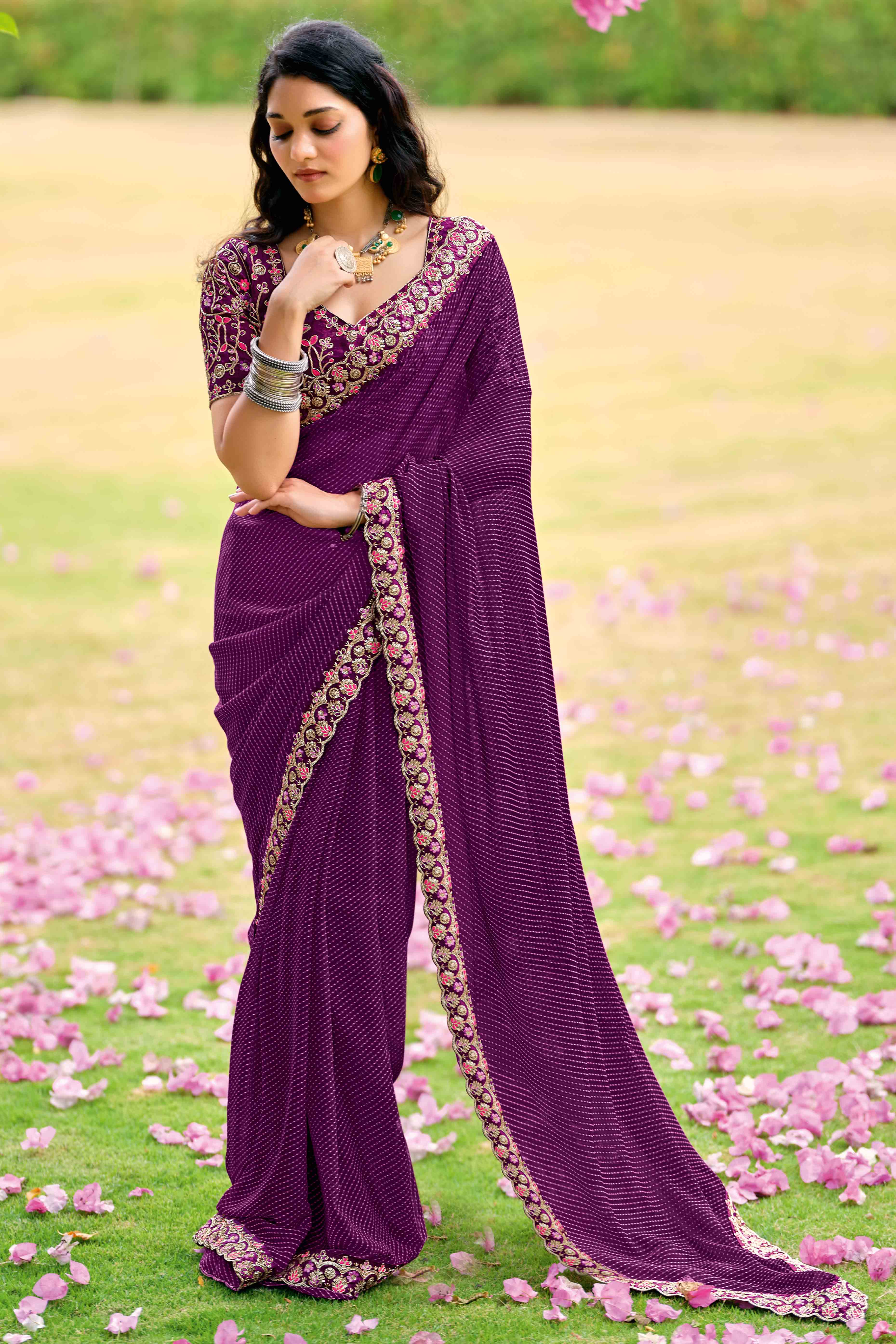 Purple Striped Printed Georgette Saree With Shimmering Sequin Embroidered Border