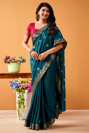 Luxurious Teal Tussar Silk Saree Featuring Traditional Bandhani Print & Peacock Jacquard Border