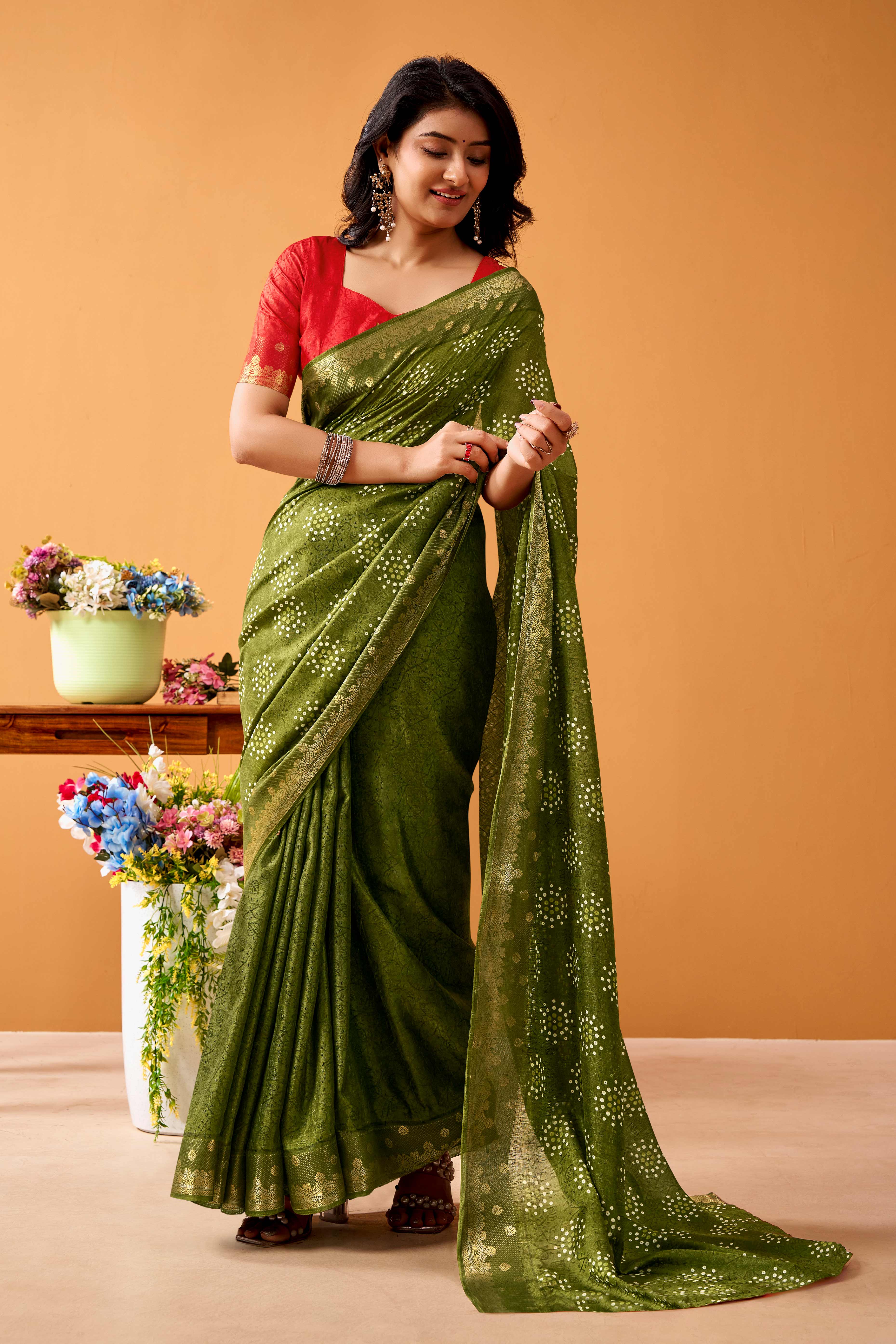 Luxurious Green Tussar Silk Saree Featuring Traditional Bandhani Print & Peacock Jacquard Border