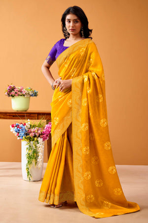 Luxurious Mustard Tussar Silk Saree Featuring Traditional Bandhani Print & Peacock Jacquard Border