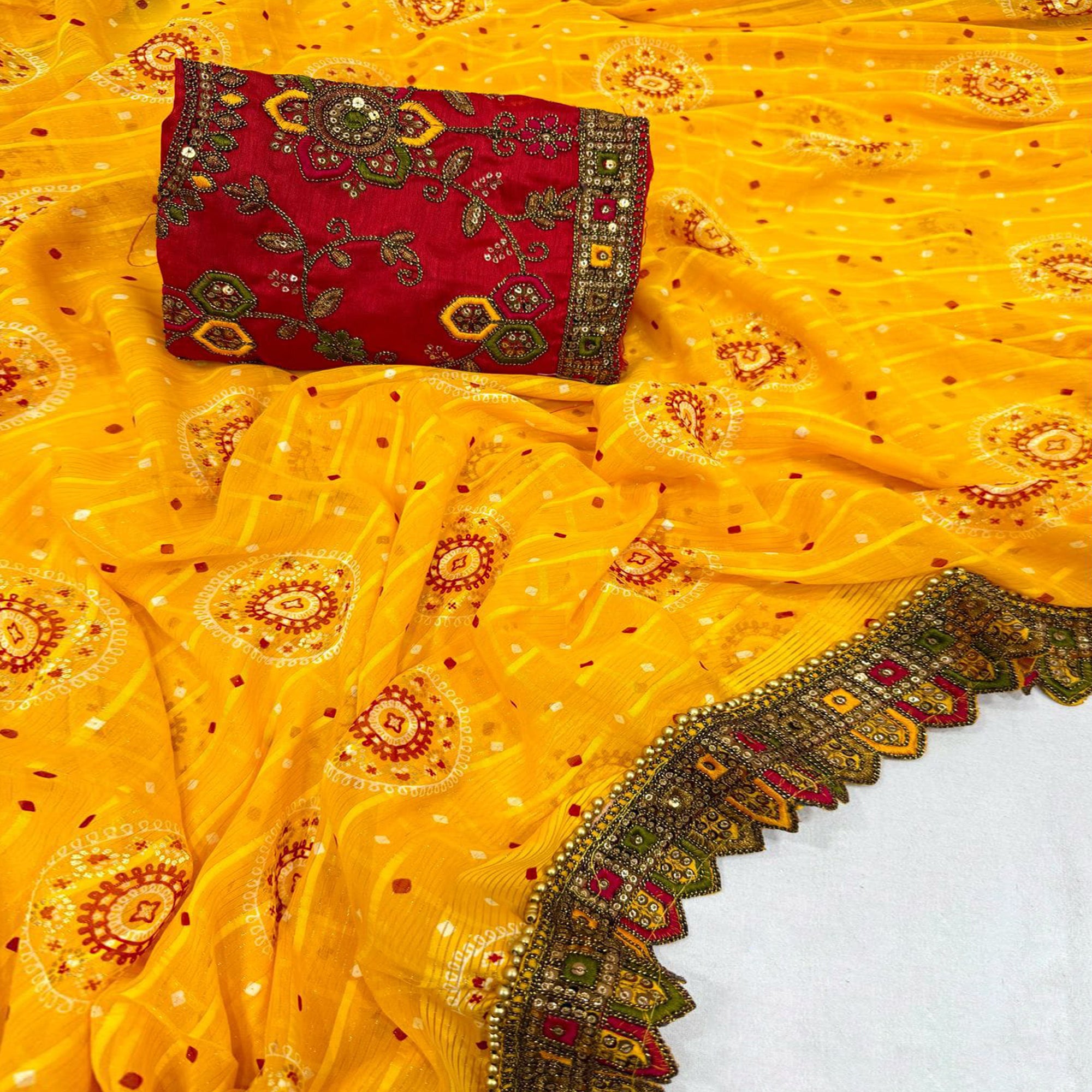 Yellow Bandhani Printed Georgette Saree for Festive Wear with Lace Detailing