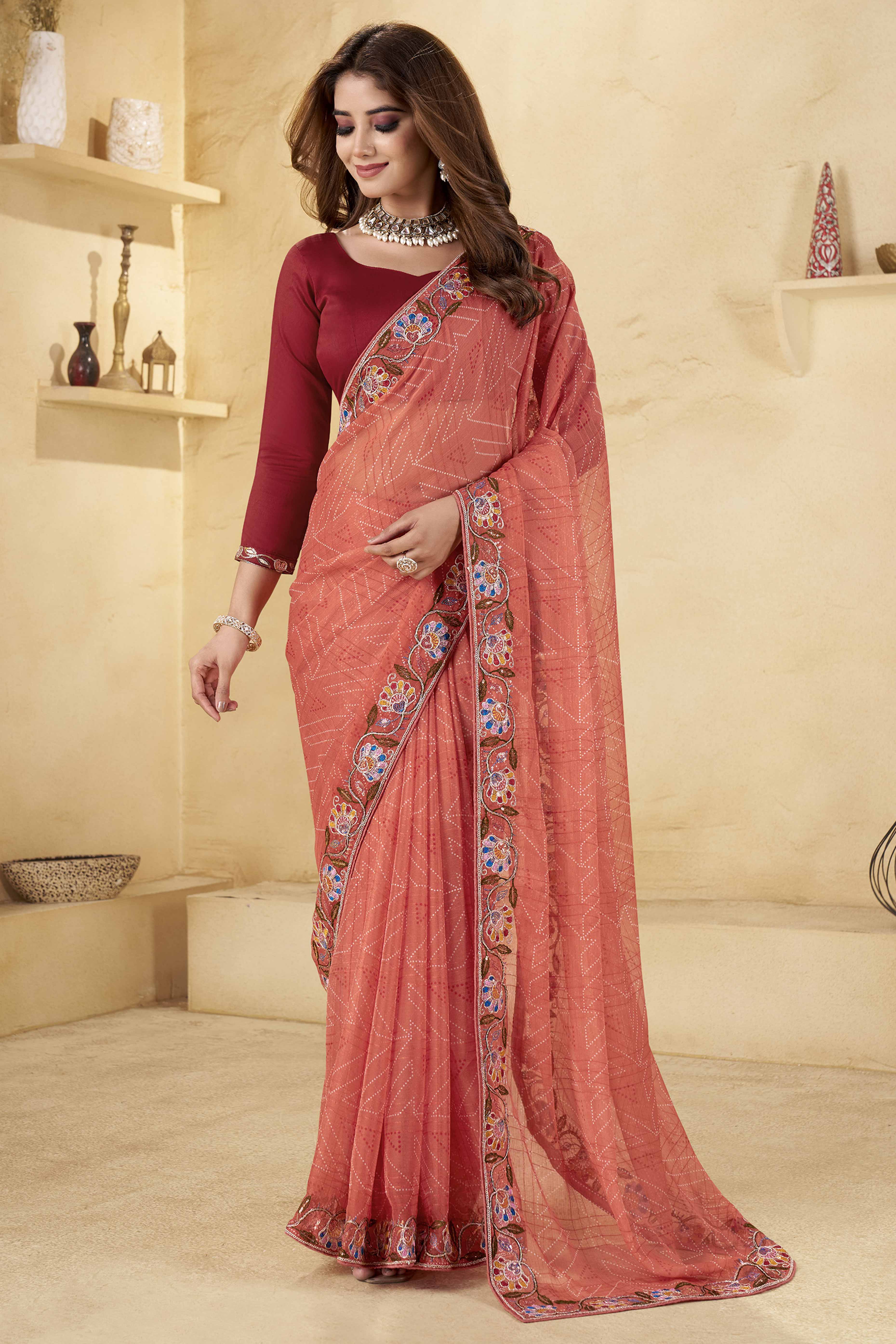 Terracotta Orange Geometric Printed Chiffon Saree Accented With Floral Sequins Embroidered Border