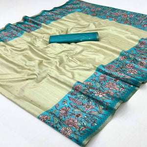 Majestic Chikoo & Blue Silk Blend Saree Enhanced With Floral Prints & Weaving Work