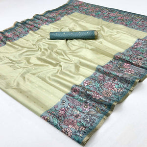 Majestic Chikoo & Teal Silk Blend Saree Enhanced With Floral Prints & Weaving Work